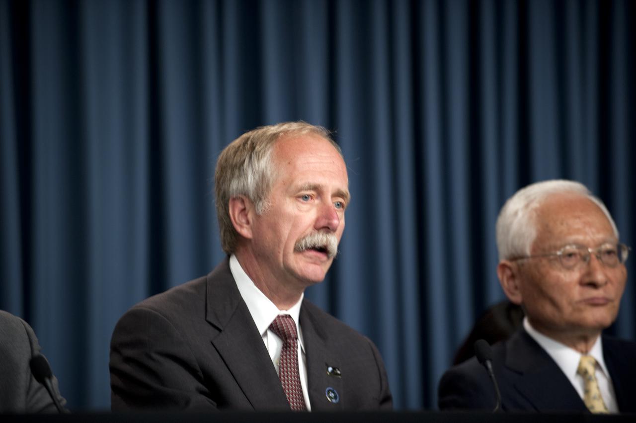 CAPE CANAVERAL, Fla.  - Bill Gerstenmaier, associate administrator for Space Operations addresses the media from the Press Site auditorium at NASA's Kennedy Space Center in Florida after the successful launch of space shuttle Discovery. Japan Aerospace Exploration Agency President Keiji Tachikawa is seated on the right.  Shuttle Discovery lifted off at 6:21 a.m. EDT on April 5, 2010. The seven-member STS-131 crew will deliver the multi-purpose logistics module Leonardo, filled with supplies, a new crew sleeping quarters and science racks that will be transferred to the International Space Station's laboratories. The crew also will switch out a gyroscope on the station’s truss, install a spare ammonia storage tank and retrieve a Japanese experiment from the station’s exterior. STS-131 is the 33rd shuttle mission to the station and the 131st shuttle mission overall. For information on the STS-131 mission and crew, visit http:__www.nasa.gov_mission_pages_shuttle_shuttlemissions_sts131_index.html.  Photo credit: NASA_Kim Shiflett