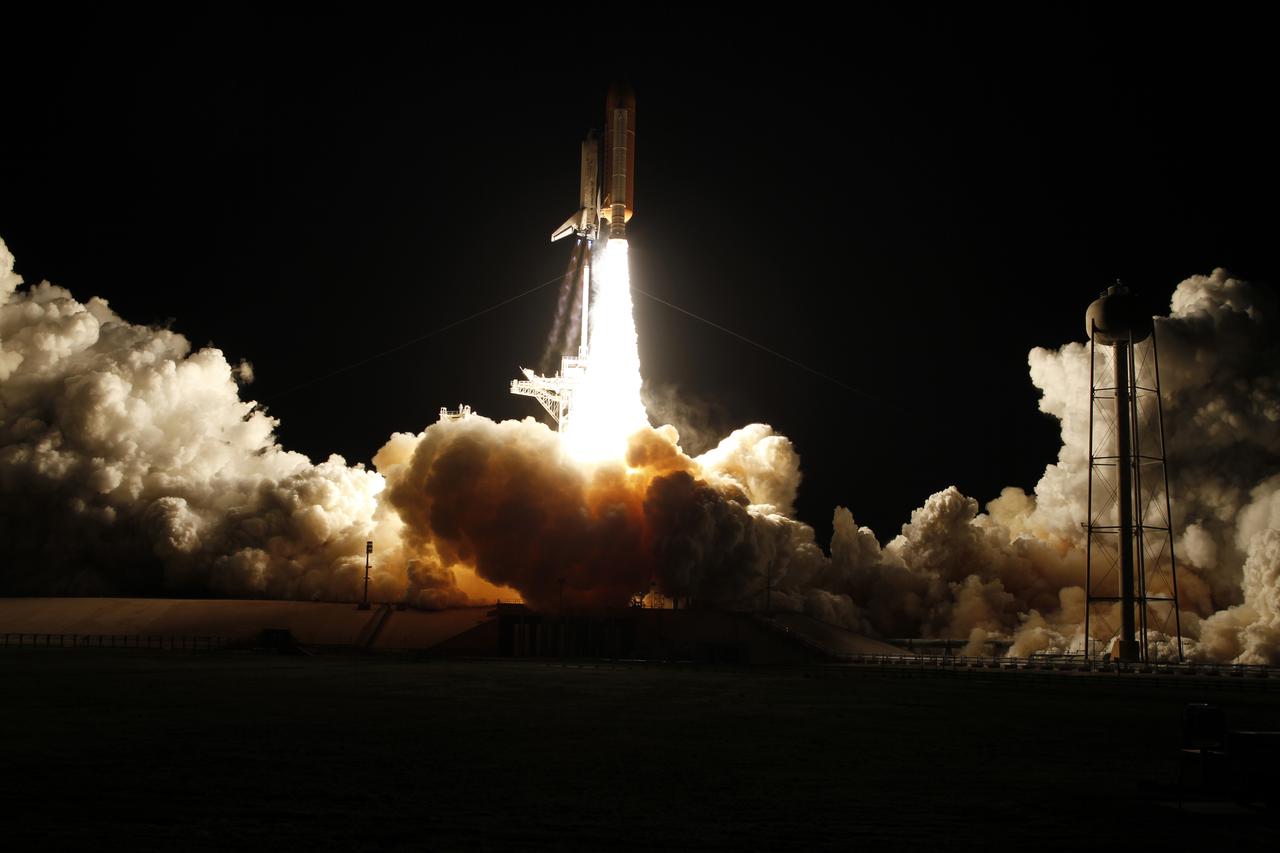 CAPE CANAVERAL, Fla. - Space shuttle Discovery clears the tower on Launch Pad 39A at NASA's Kennedy Space Center in Florida, its two solid rocket boosters and three main engines generating nearly seven million pounds of thrust.  Liftoff on the STS-131 mission was on time at 6:21 a.m. EDT April 5.  The seven-member crew will deliver the multi-purpose logistics module Leonardo, filled with supplies, a new crew sleeping quarters and science racks that will be transferred to the International Space Station's laboratories.  The crew also will switch out a gyroscope on the station’s truss, install a spare ammonia storage tank and retrieve a Japanese experiment from the station’s exterior.  STS-131 is the 33rd shuttle mission to the station and the 131st shuttle mission overall. For information on the STS-131 mission and crew, visit http:__www.nasa.gov_mission_pages_shuttle_shuttlemissions_sts131_index.html.  Photo courtesy of Scott Andrews