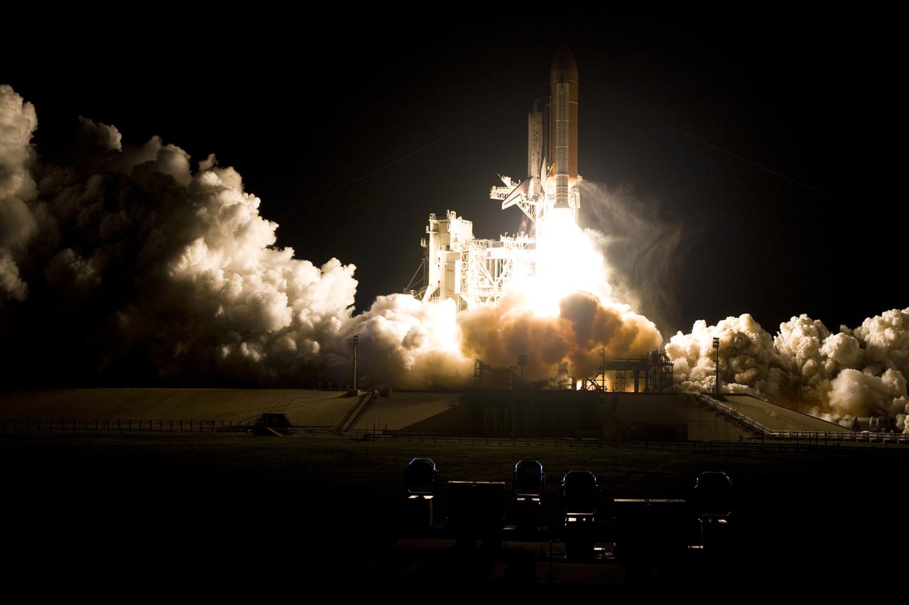 CAPE CANAVERAL, Fla. - An exhaust cloud billows around Launch Pad 39A at NASA's Kennedy Space Center in Florida as space shuttle Discovery lifts off into the predawn sky at 6:21 a.m. EDT April 5 to begin the STS-131 mission.  The seven-member crew will deliver the multi-purpose logistics module Leonardo, filled with supplies, a new crew sleeping quarters and science racks that will be transferred to the International Space Station's laboratories.  The crew also will switch out a gyroscope on the station’s truss, install a spare ammonia storage tank and retrieve a Japanese experiment from the station’s exterior.  STS-131 is the 33rd shuttle mission to the station and the 131st shuttle mission overall. For information on the STS-131 mission and crew, visit http:__www.nasa.gov_mission_pages_shuttle_shuttlemissions_sts131_index.html.  Photo courtesy of Scott Andrews