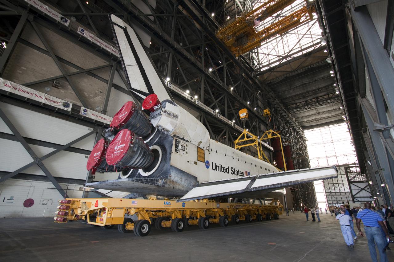 CAPE CANAVERAL, Fla. – At NASA's Kennedy Space Center in Florida, space shuttle Atlantis has arrived in the transfer aisle of the Vehicle Assembly Building, or VAB, and is ready to be lifted into a high bay. The shuttle was moved from Orbiter Processing Facility-1 where it was processed for its upcoming STS-132 mission.  In the VAB, Atlantis will be lifted into a high bay where it will be mated to its external fuel tank and solid rocket boosters.  The six-member STS-132 crew will deliver an Integrated Cargo Carrier, or ICC, and the Russian-built Mini-Research Module-1, or MRM-1, to the International Space Station.  The ICC is an unpressurized flat bed pallet and keel yoke assembly used to support the transfer of exterior cargo from the shuttle to the space station.  The MRM-1, known as Rassvet, is the second in a series of new pressurized components for Russia and will be permanently attached to the Earth-facing port of the Zarya control module. Rassvet, which translates to 'dawn,' will be used for cargo storage and will provide an additional docking port to the station.  STS-132 is the 34th mission to the station and the 132nd shuttle mission overall.   Launch is targeted for May 14.  For information on the STS-132 mission, visit http:__www.nasa.gov_mission_pages_shuttle_shuttlemissions_sts132_index.html. Photo credit: NASA_Jack Pfaller