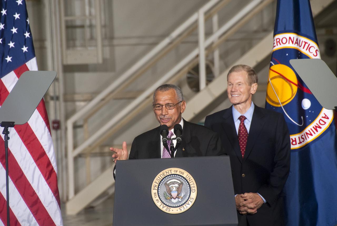 CAPE CANAVERAL, Fla. - In the Operations and Checkout Building at NASA's Kennedy Space Center in Florida, NASA Administrator Charles Bolden, at the podium, introduces President Barack Obama to the participants of the Conference on the American Space Program for the 21st Century.  Behind him is U. S. Sen. Bill Nelson.  President Obama opened the conference with remarks on the new course his administration is charting for NASA and the future of U.S. leadership in human spaceflight. Photo credit: NASA_Jim Grossmann