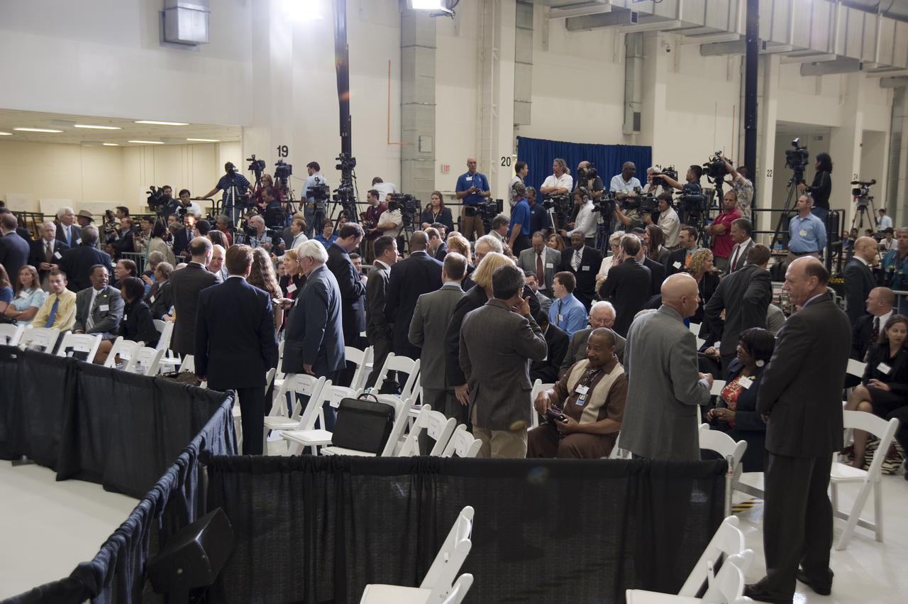 CAPE CANAVERAL, Fla. - In the Operations and Checkout Building at NASA's Kennedy Space Center in Florida, participants of the Conference on the American Space Program for the 21st Century await the arrival of President Barack Obama. In his address, President Obama will explain the new course his administration is charting for NASA and the future of U.S. leadership in human spaceflight. Photo credit: NASA_Kim Shiflett