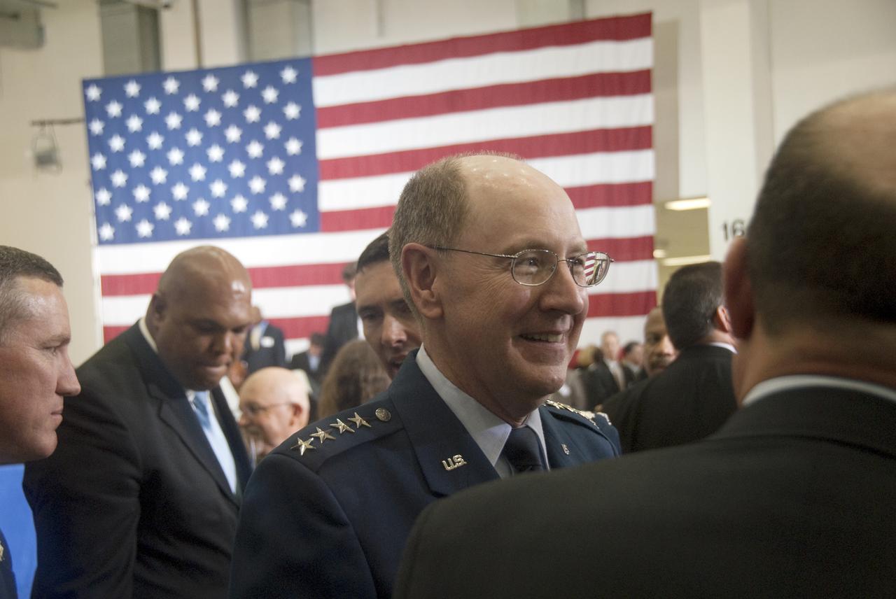 CAPE CANAVERAL, Fla.  - In the Operations and Checkout Building at NASA's Kennedy Space Center in Florida, Gen. C. Robert 'Bob' Kehler, Commander of the Air Force Space Command at Peterson Air Force Base in Colorado, speaks with other members of the Conference on the American Space Program for the 21st Century following President Barack Obama's remarks describing the new course his administration is charting for NASA and the future of U.S. leadership in human spaceflight. Photo credit: NASA_Jim Grossmann
