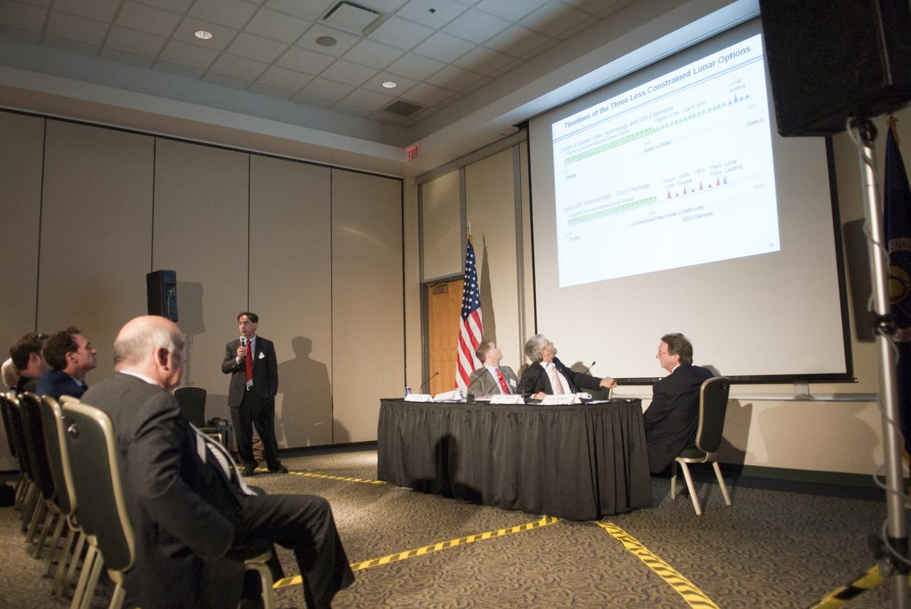 CAPE CANAVERAL, Fla. - In the Atlas_Redstone Room of the Debus Center at NASA's Kennedy Space Center Visitor Complex in Florida, Dr. Edward F. Crawley, Ford professor of engineering at MIT gives his presentation at the 'Expanding our Reach into the Solar System' break-out session, part of the Conference on the American Space Program for the 21st Century. The panel, moderated by John Holdren, assistant to the President for science and technology and director of the White House Office of Science and Technology Policy (center), included Crawley, Scott Hubbard, former director of NASA's Ames Research Center (right) and NASA Astronaut John Grunsfeld. Photo credit: NASA_Jim Grossmann