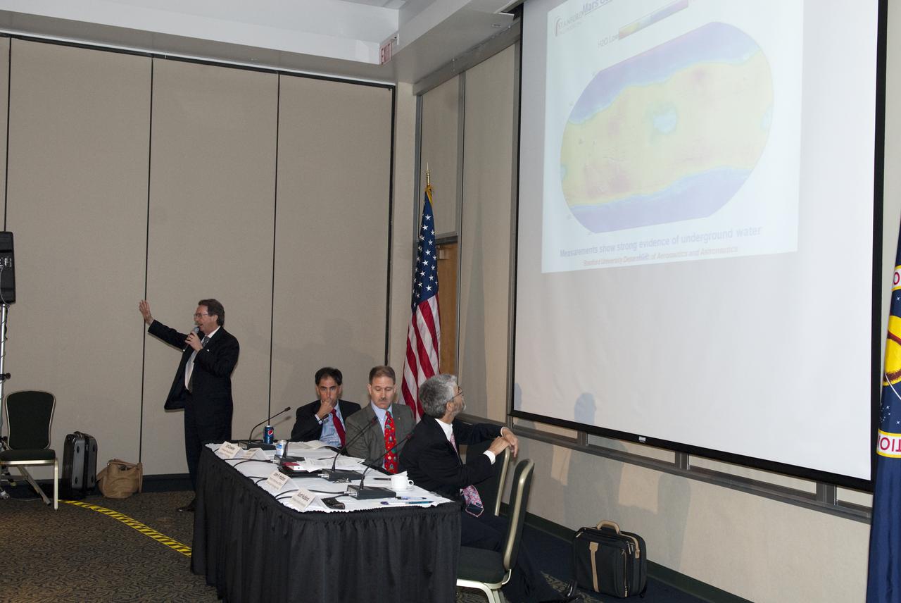 CAPE CANAVERAL, Fla. - In the Atlas_Redstone Room of the Debus Center at NASA's Kennedy Space Center Visitor Complex in Florida, Scott Hubbard, former director of NASA's Ames Research Center, addresses the participants at the 'Expanding our Reach into the Solar System' break-out session, part of the Conference on the American Space Program for the 21st Century. The panel, moderated by John Holdren, assistant to the President for science and technology and director of the White House Office of Science and Technology Policy (right), included Hubbard, Dr. Edward F. Crawley, Ford professor of engineering at MIT and NASA Astronaut John Grunsfeld. Photo credit: NASA_Jim Grossmann
