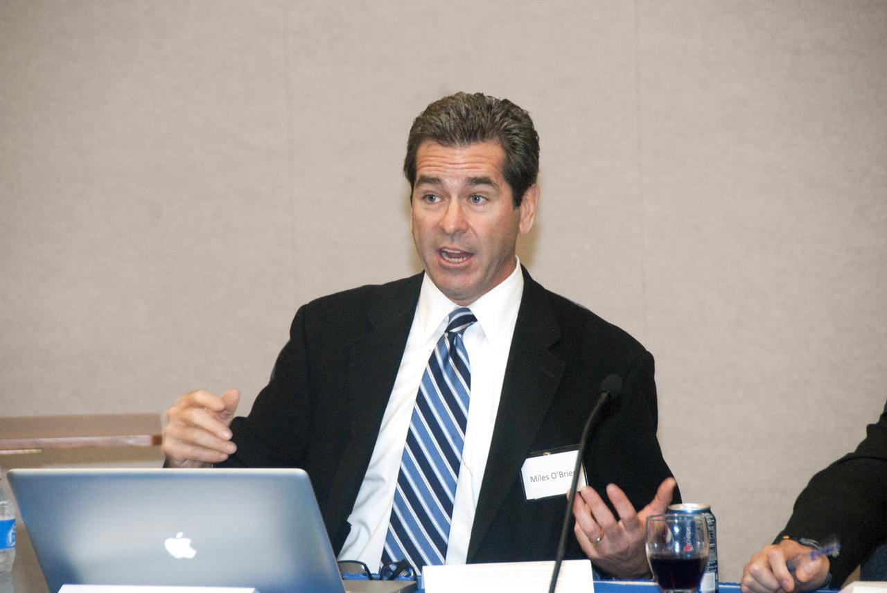 CAPE CANAVERAL, Fla.  - In the mission briefing room of the Operations and Checkout Building at NASA's Kennedy Space Center in Florida, Miles O'Brien, a member of the NASA Advisory Council and panel moderator, heads up the second break-out session, 'Increasing Access To and Utilization of the International Space Station,' that is part of the Conference on the American Space Program for the 21st Century. The distinguished panel for this session includes Bretton Alexander, President of the Commercial Spaceflight Federation; NASA Astronaut Mike Foale and Tom Pickens, President and Chief Executive Officer of Astrotech Space Operations. Photo Credit: NASA_Jim Grossmann
