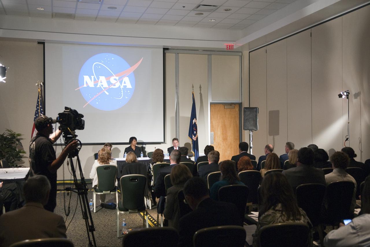 CAPE CANAVERAL, Fla. - In the Juno_Jupiter room of the Debus Center at NASA Kennedy Space Center Visitor Complex in Florida, Lori Garver, NASA Deputy Administrator (partially obscured left) heads up the fourth break-out session, 'Harnessing Space to Expand Economic Opportunity,' that is part of the Conference on the American Space Program for the 21st Century. The distinguished panel for this session is: Mae Jamison, Founder and President of The Jamison Group Inc.; Greg Junemann, President of the International Federation of Professional and Technical Engineers, AFL-CIO and CLC (not in frame) and Dale Ketcham, Director of the Spaceport Research and Technology Institute at the University of Central Florida. Photo Credit: NASA_Jim Grossmann