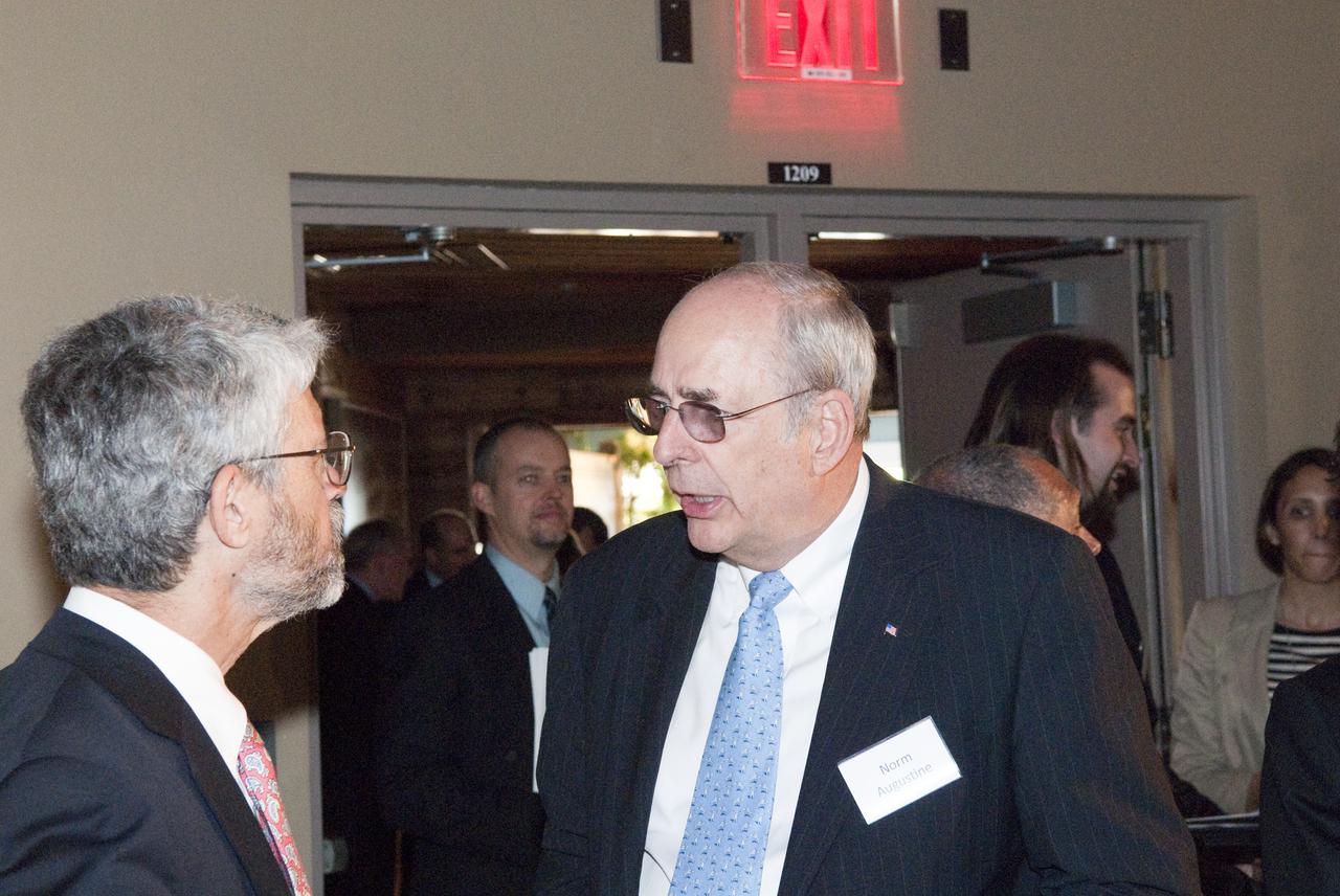 CAPE CANAVERAL, Fla. - Prior to the wrap up of the Conference on the American Space Program for the 21st Century held in the Astronaut Encounter Theater at the NASA Kennedy Space Center Visitor Complex in Florida, John Holdren, assistant to the President for science and technology and director of the White House Office of Science and Technology Policy and Norman R. Augustine, chair of the Review of U.S. Human Space Flight Plans Committee, took a few moments to discuss the event. Photo Credit: NASA_Jim Grossmann