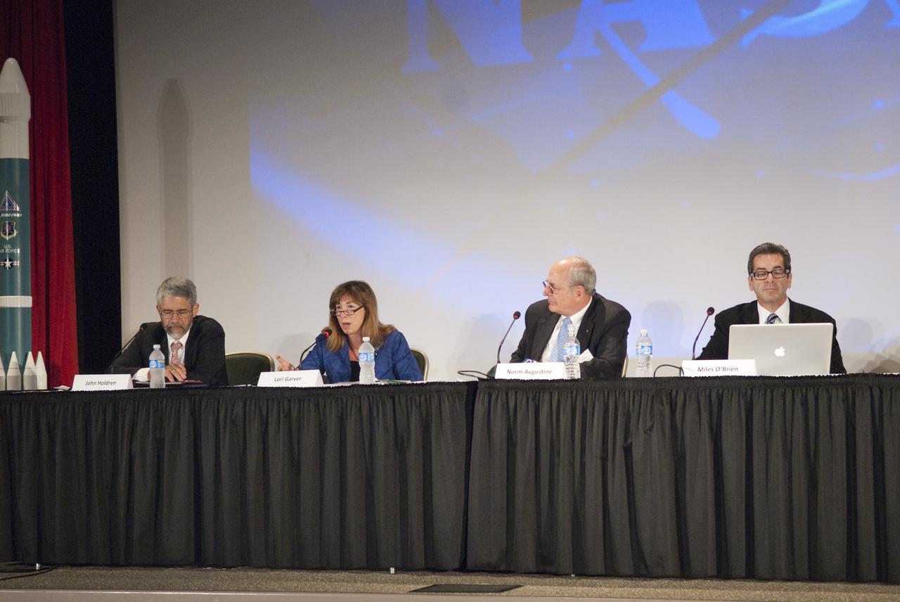 CAPE CANAVERAL, Fla. - In the Astronaut Encounter Theater at the NASA Kennedy Space Center Visitor Complex in Florida, a distinguished panel gathered to wrap up the Conference on the American Space Program for the 21st Century. The panel included John Holdren, assistant to the President for science and technology and director of the White House Office of Science and Technology Policy (left); Lori Garver, NASA Deputy Administrator; Norman R. Augustine, chair of the Review of U.S. Human Space Flight Plans Committee, and Miles O'Brien, a member of the NASA Advisory Council. Photo Credit: NASA_Jim Grossmann
