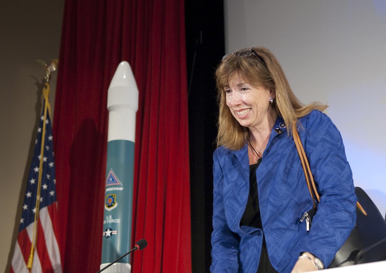 CAPE CANAVERAL, Fla.  - In the Astronaut Encounter Theater at the NASA Kennedy Space Center Visitor Complex in Florida, Lori Garver, NASA Deputy Administrator, speaks with a member of the audience after the conclusion of the Conference on the American Space Program for the 21st Century. Photo Credit: NASA_Jim Grossmann