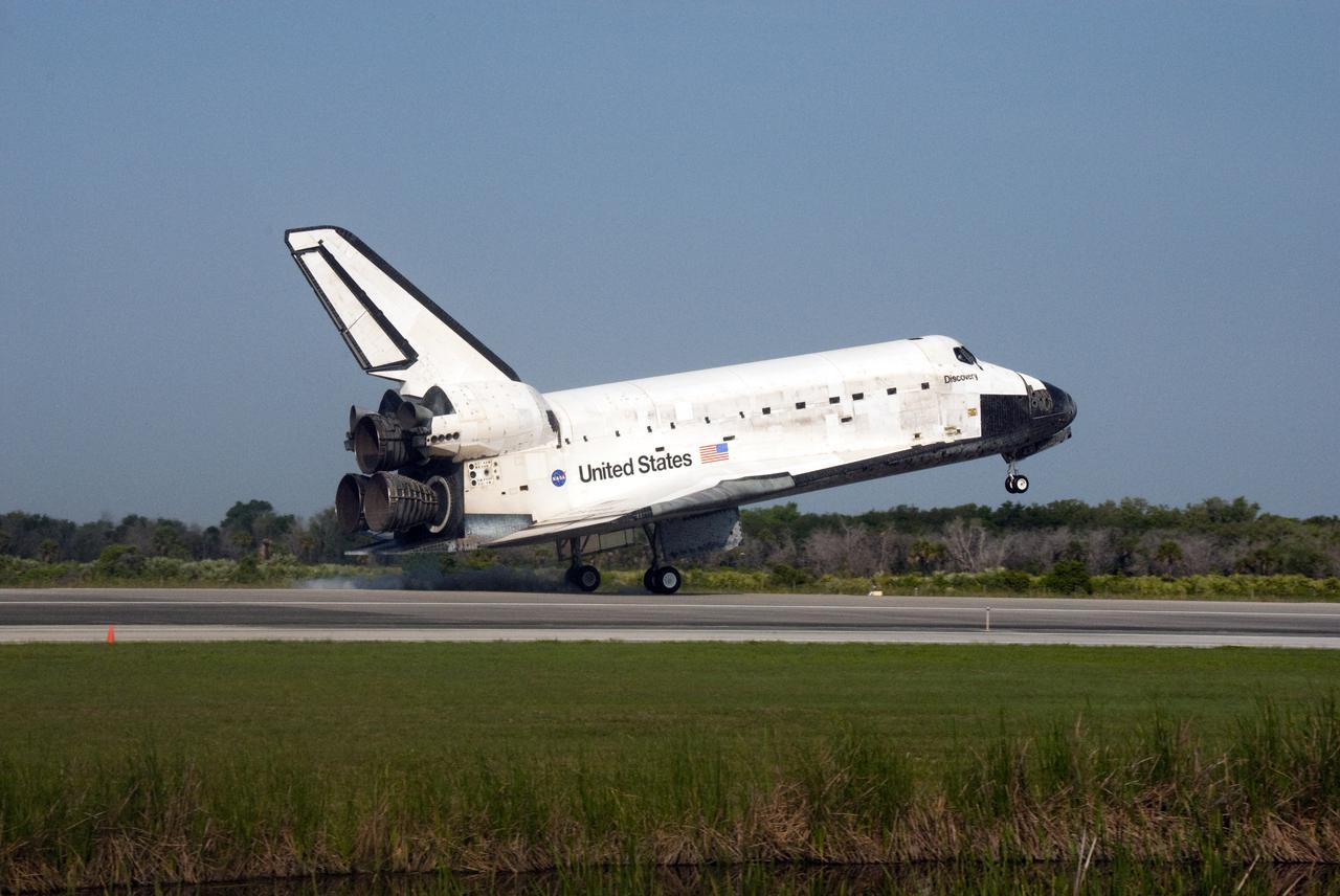 CAPE CANAVERAL, Fla.  - Space shuttle Discovery lands on Runway 33 at the Shuttle Landing Facility at NASA's Kennedy Space Center in Florida at 9:08 a.m. EDT, completing the 15-day STS-131 mission to the International Space Station. Main gear touchdown was at 9:08:35 a.m. EDT followed by nose gear touchdown at 9:08:47 a.m. and wheelstop at 9:09:33 a.m.  Aboard are Commander Alan Poindexter; Pilot James P. Dutton Jr.; and Mission Specialists Rick Mastracchio, Clayton Anderson, Dorothy Metcalf-Lindenburger, Stephanie Wilson and Naoko Yamazaki of the Japan Aerospace Exploration Agency.  The seven-member STS-131 crew carried the multi-purpose logistics module Leonardo, filled with supplies, a new crew sleeping quarters and science racks that were transferred to the International Space Station's laboratories.  The crew also switched out a gyroscope on the station’s truss, installed a spare ammonia storage tank and retrieved a Japanese experiment from the station’s exterior.  STS-131 is the 33rd shuttle mission to the station and the 131st shuttle mission overall. For information on the STS-131 mission and crew, visit http:__www.nasa.gov_mission_pages_shuttle_shuttlemissions_sts131_index.html.  Photo Credit: NASA_Jim Grossmann