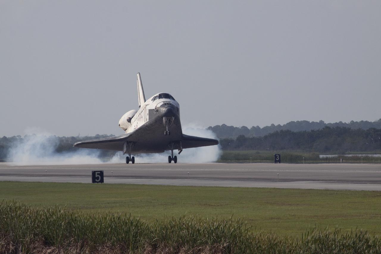 CAPE CANAVERAL, Fla.  - Space shuttle Discovery lands on Runway 33 at the Shuttle Landing Facility at NASA's Kennedy Space Center in Florida at 9:08 a.m. EDT, completing the 15-day STS-131 mission to the International Space Station. Main gear touchdown was at 9:08:35 a.m. EDT followed by nose gear touchdown at 9:08:47 a.m. and wheelstop at 9:09:33 a.m.  Aboard are Commander Alan Poindexter; Pilot James P. Dutton Jr.; and Mission Specialists Rick Mastracchio, Clayton Anderson, Dorothy Metcalf-Lindenburger, Stephanie Wilson and Naoko Yamazaki of the Japan Aerospace Exploration Agency.  The seven-member STS-131 crew carried the multi-purpose logistics module Leonardo, filled with supplies, a new crew sleeping quarters and science racks that were transferred to the International Space Station's laboratories.  The crew also switched out a gyroscope on the station’s truss, installed a spare ammonia storage tank and retrieved a Japanese experiment from the station’s exterior.  STS-131 is the 33rd shuttle mission to the station and the 131st shuttle mission overall. For information on the STS-131 mission and crew, visit http:__www.nasa.gov_mission_pages_shuttle_shuttlemissions_sts131_index.html.  Photo Credit: NASA_Jack Pfaller