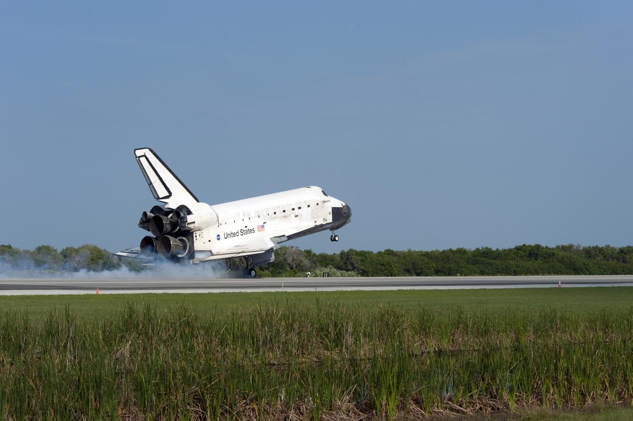 CAPE CANAVERAL, Fla.  - Space shuttle Discovery lands on Runway 33 at the Shuttle Landing Facility at NASA's Kennedy Space Center in Florida at 9:08 a.m. EDT, completing the 15-day STS-131 mission to the International Space Station. Main gear touchdown was at 9:08:35 a.m. EDT followed by nose gear touchdown at 9:08:47 a.m. and wheelstop at 9:09:33 a.m.  Aboard are Commander Alan Poindexter; Pilot James P. Dutton Jr.; and Mission Specialists Rick Mastracchio, Clayton Anderson, Dorothy Metcalf-Lindenburger, Stephanie Wilson and Naoko Yamazaki of the Japan Aerospace Exploration Agency.  The seven-member STS-131 crew carried the multi-purpose logistics module Leonardo, filled with supplies, a new crew sleeping quarters and science racks that were transferred to the International Space Station's laboratories.  The crew also switched out a gyroscope on the station’s truss, installed a spare ammonia storage tank and retrieved a Japanese experiment from the station’s exterior.  STS-131 is the 33rd shuttle mission to the station and the 131st shuttle mission overall. For information on the STS-131 mission and crew, visit http:__www.nasa.gov_mission_pages_shuttle_shuttlemissions_sts131_index.html.  Photo Credit: NASA_Carl Winebarger
