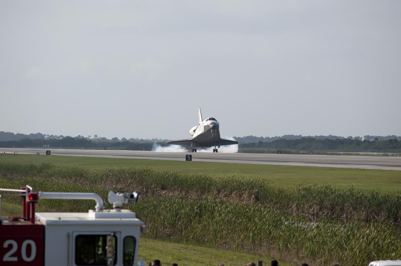 CAPE CANAVERAL, Fla.  - Space shuttle Discovery lands on Runway 33 at the Shuttle Landing Facility at NASA's Kennedy Space Center in Florida at 9:08 a.m. EDT, completing the 15-day STS-131 mission to the International Space Station. Main gear touchdown was at 9:08:35 a.m. EDT followed by nose gear touchdown at 9:08:47 a.m. and wheelstop at 9:09:33 a.m.  Aboard are Commander Alan Poindexter; Pilot James P. Dutton Jr.; and Mission Specialists Rick Mastracchio, Clayton Anderson, Dorothy Metcalf-Lindenburger, Stephanie Wilson and Naoko Yamazaki of the Japan Aerospace Exploration Agency.  The seven-member STS-131 crew carried the multi-purpose logistics module Leonardo, filled with supplies, a new crew sleeping quarters and science racks that were transferred to the International Space Station's laboratories.  The crew also switched out a gyroscope on the station’s truss, installed a spare ammonia storage tank and retrieved a Japanese experiment from the station’s exterior.  STS-131 is the 33rd shuttle mission to the station and the 131st shuttle mission overall. For information on the STS-131 mission and crew, visit http:__www.nasa.gov_mission_pages_shuttle_shuttlemissions_sts131_index.html.  Photo Credit: NASA_Tony Gray