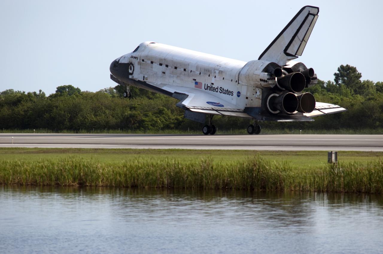 CAPE CANAVERAL, Fla.  - Space shuttle Discovery lands on Runway 33 at the Shuttle Landing Facility at NASA's Kennedy Space Center in Florida at 9:08 a.m. EDT, completing the 15-day STS-131 mission to the International Space Station. Main gear touchdown was at 9:08:35 a.m. EDT followed by nose gear touchdown at 9:08:47 a.m. and wheelstop at 9:09:33 a.m.  Aboard are Commander Alan Poindexter; Pilot James P. Dutton Jr.; and Mission Specialists Rick Mastracchio, Clayton Anderson, Dorothy Metcalf-Lindenburger, Stephanie Wilson and Naoko Yamazaki of the Japan Aerospace Exploration Agency.  The seven-member STS-131 crew carried the multi-purpose logistics module Leonardo, filled with supplies, a new crew sleeping quarters and science racks that were transferred to the International Space Station's laboratories.  The crew also switched out a gyroscope on the station’s truss, installed a spare ammonia storage tank and retrieved a Japanese experiment from the station’s exterior.  STS-131 is the 33rd shuttle mission to the station and the 131st shuttle mission overall. For information on the STS-131 mission and crew, visit http:__www.nasa.gov_mission_pages_shuttle_shuttlemissions_sts131_index.html.  Photo Credit: NASA_Rusty Backer