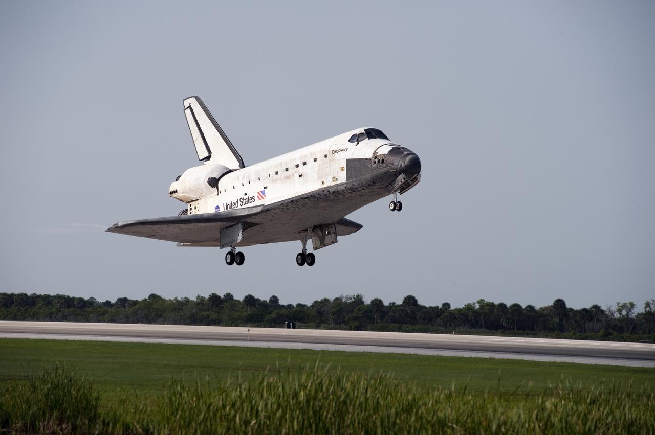CAPE CANAVERAL, Fla. - Space shuttle Discovery nears touchdown on Runway 33 at the Shuttle Landing Facility at NASA's Kennedy Space Center in Florida.  Landing was at 9:08 a.m. EDT, completing the 15-day STS-131 mission to the International Space Station.  Main gear touchdown was at 9:08:35 a.m. EDT followed by nose gear touchdown at 9:08:47 a.m. and wheelstop at 9:09:33 a.m.  Aboard are Commander Alan Poindexter; Pilot James P. Dutton Jr.; and Mission Specialists Rick Mastracchio, Clayton Anderson, Dorothy Metcalf-Lindenburger, Stephanie Wilson and Naoko Yamazaki of the Japan Aerospace Exploration Agency.  The seven-member STS-131 crew carried the multi-purpose logistics module Leonardo, filled with supplies, a new crew sleeping quarters and science racks that were transferred to the International Space Station's laboratories.  The crew also switched out a gyroscope on the station’s truss, installed a spare ammonia storage tank and retrieved a Japanese experiment from the station’s exterior.  STS-131 is the 33rd shuttle mission to the station and the 131st shuttle mission overall. For information on the STS-131 mission and crew, visit http:__www.nasa.gov_mission_pages_shuttle_shuttlemissions_sts131_index.html.  Photo credit: NASA_Ben Cooper