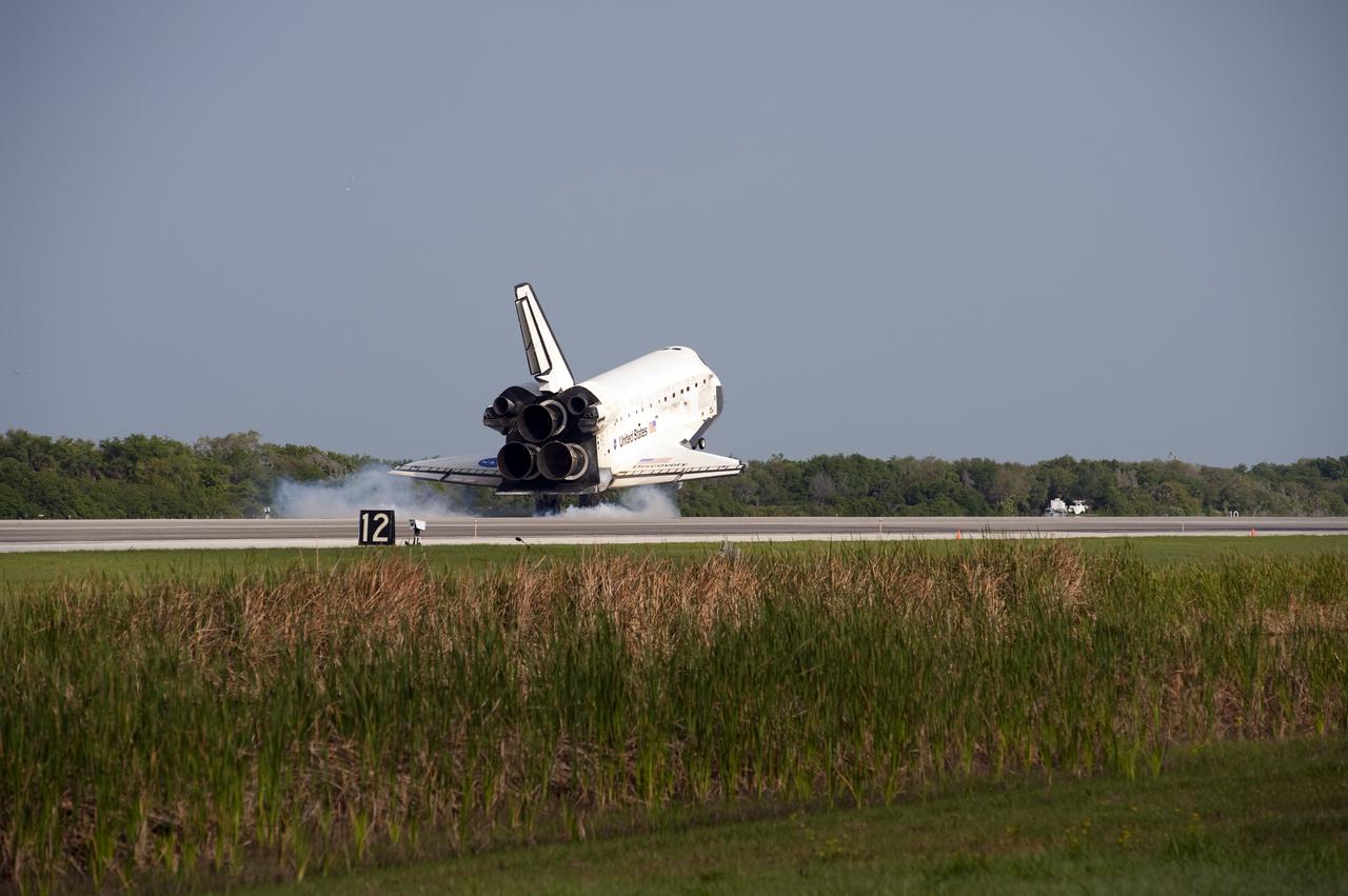 CAPE CANAVERAL, Fla. - Space shuttle Discovery lands on Runway 33 at the Shuttle Landing Facility at NASA's Kennedy Space Center in Florida at 9:08 a.m. EDT, completing the 15-day STS-131 mission to the International Space Station.  Main gear touchdown was at 9:08:35 a.m. EDT followed by nose gear touchdown at 9:08:47 a.m. and wheelstop at 9:09:33 a.m.  Aboard are Commander Alan Poindexter; Pilot James P. Dutton Jr.; and Mission Specialists Rick Mastracchio, Clayton Anderson, Dorothy Metcalf-Lindenburger, Stephanie Wilson and Naoko Yamazaki of the Japan Aerospace Exploration Agency.  The seven-member STS-131 crew carried the multi-purpose logistics module Leonardo, filled with supplies, a new crew sleeping quarters and science racks that were transferred to the International Space Station's laboratories.  The crew also switched out a gyroscope on the station’s truss, installed a spare ammonia storage tank and retrieved a Japanese experiment from the station’s exterior.  STS-131 is the 33rd shuttle mission to the station and the 131st shuttle mission overall. For information on the STS-131 mission and crew, visit http:__www.nasa.gov_mission_pages_shuttle_shuttlemissions_sts131_index.html.  Photo credit: NASA_Ben Cooper