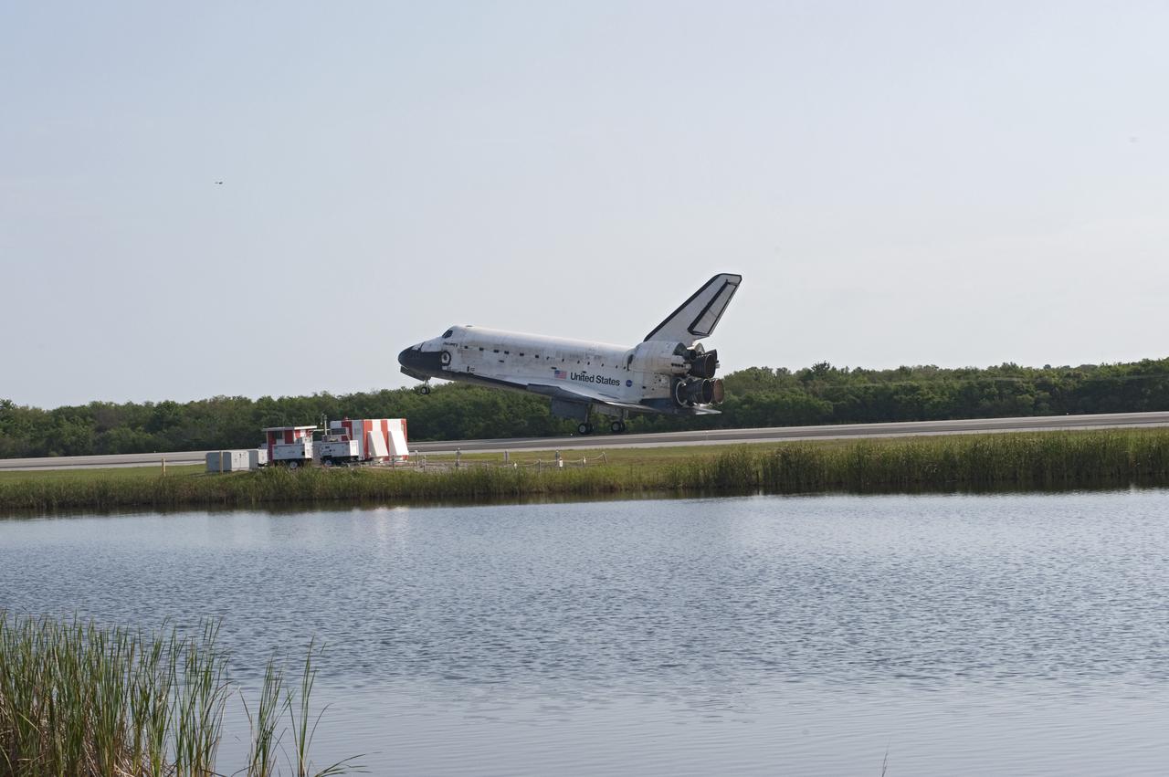 CAPE CANAVERAL, Fla. - Space shuttle Discovery nears touchdown on Runway 33 at the Shuttle Landing Facility at NASA's Kennedy Space Center in Florida.  Landing was at 9:08 a.m. EDT, completing the 15-day STS-131 mission to the International Space Station.  Main gear touchdown was at 9:08:35 a.m. EDT followed by nose gear touchdown at 9:08:47 a.m. and wheelstop at 9:09:33 a.m.  Aboard are Commander Alan Poindexter; Pilot James P. Dutton Jr.; and Mission Specialists Rick Mastracchio, Clayton Anderson, Dorothy Metcalf-Lindenburger, Stephanie Wilson and Naoko Yamazaki of the Japan Aerospace Exploration Agency.  The seven-member STS-131 crew carried the multi-purpose logistics module Leonardo, filled with supplies, a new crew sleeping quarters and science racks that were transferred to the International Space Station's laboratories.  The crew also switched out a gyroscope on the station’s truss, installed a spare ammonia storage tank and retrieved a Japanese experiment from the station’s exterior.  STS-131 is the 33rd shuttle mission to the station and the 131st shuttle mission overall. For information on the STS-131 mission and crew, visit http:__www.nasa.gov_mission_pages_shuttle_shuttlemissions_sts131_index.html.  Photo credit: NASA_Chuck Tintera