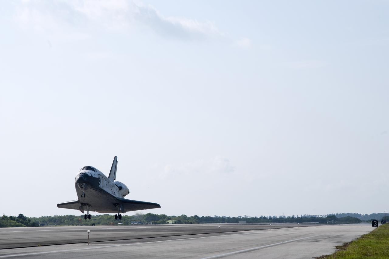CAPE CANAVERAL, Fla. - Space shuttle Discovery nears touchdown on Runway 33 at the Shuttle Landing Facility at NASA's Kennedy Space Center in Florida.  Landing was at 9:08 a.m. EDT, completing the 15-day STS-131 mission to the International Space Station.  Main gear touchdown was at 9:08:35 a.m. EDT followed by nose gear touchdown at 9:08:47 a.m. and wheelstop at 9:09:33 a.m.  Aboard are Commander Alan Poindexter; Pilot James P. Dutton Jr.; and Mission Specialists Rick Mastracchio, Clayton Anderson, Dorothy Metcalf-Lindenburger, Stephanie Wilson and Naoko Yamazaki of the Japan Aerospace Exploration Agency.  The seven-member STS-131 crew carried the multi-purpose logistics module Leonardo, filled with supplies, a new crew sleeping quarters and science racks that were transferred to the International Space Station's laboratories.  The crew also switched out a gyroscope on the station’s truss, installed a spare ammonia storage tank and retrieved a Japanese experiment from the station’s exterior.  STS-131 is the 33rd shuttle mission to the station and the 131st shuttle mission overall. For information on the STS-131 mission and crew, visit http:__www.nasa.gov_mission_pages_shuttle_shuttlemissions_sts131_index.html.  Photo credit: NASA_Tony Gray and Tom Farrar