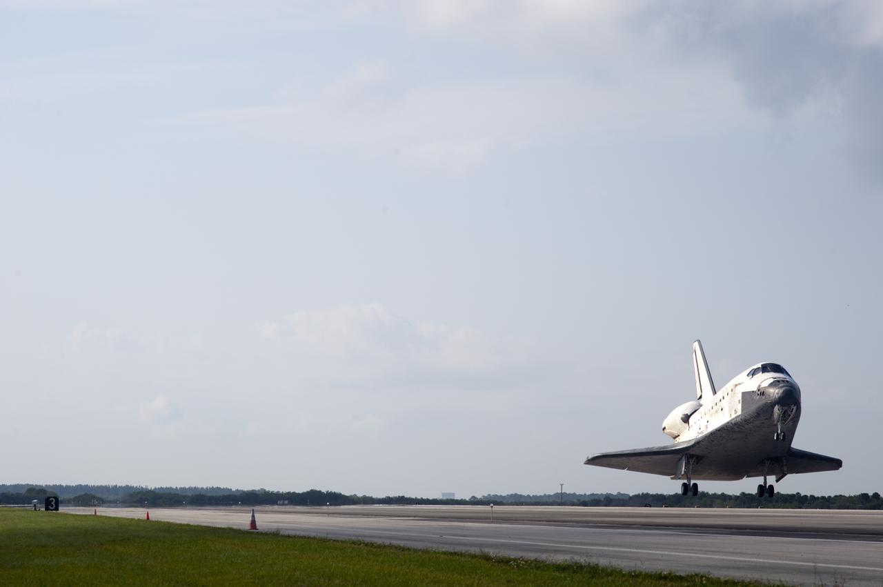 CAPE CANAVERAL, Fla. - Space shuttle Discovery nears touchdown on Runway 33 at the Shuttle Landing Facility at NASA's Kennedy Space Center in Florida.  Landing was at 9:08 a.m. EDT, completing the 15-day STS-131 mission to the International Space Station.  Main gear touchdown was at 9:08:35 a.m. EDT followed by nose gear touchdown at 9:08:47 a.m. and wheelstop at 9:09:33 a.m.  Aboard are Commander Alan Poindexter; Pilot James P. Dutton Jr.; and Mission Specialists Rick Mastracchio, Clayton Anderson, Dorothy Metcalf-Lindenburger, Stephanie Wilson and Naoko Yamazaki of the Japan Aerospace Exploration Agency.  The seven-member STS-131 crew carried the multi-purpose logistics module Leonardo, filled with supplies, a new crew sleeping quarters and science racks that were transferred to the International Space Station's laboratories.  The crew also switched out a gyroscope on the station’s truss, installed a spare ammonia storage tank and retrieved a Japanese experiment from the station’s exterior.  STS-131 is the 33rd shuttle mission to the station and the 131st shuttle mission overall. For information on the STS-131 mission and crew, visit http:__www.nasa.gov_mission_pages_shuttle_shuttlemissions_sts131_index.html.  Photo credit: NASA_Tony Gray and Tom Farrar