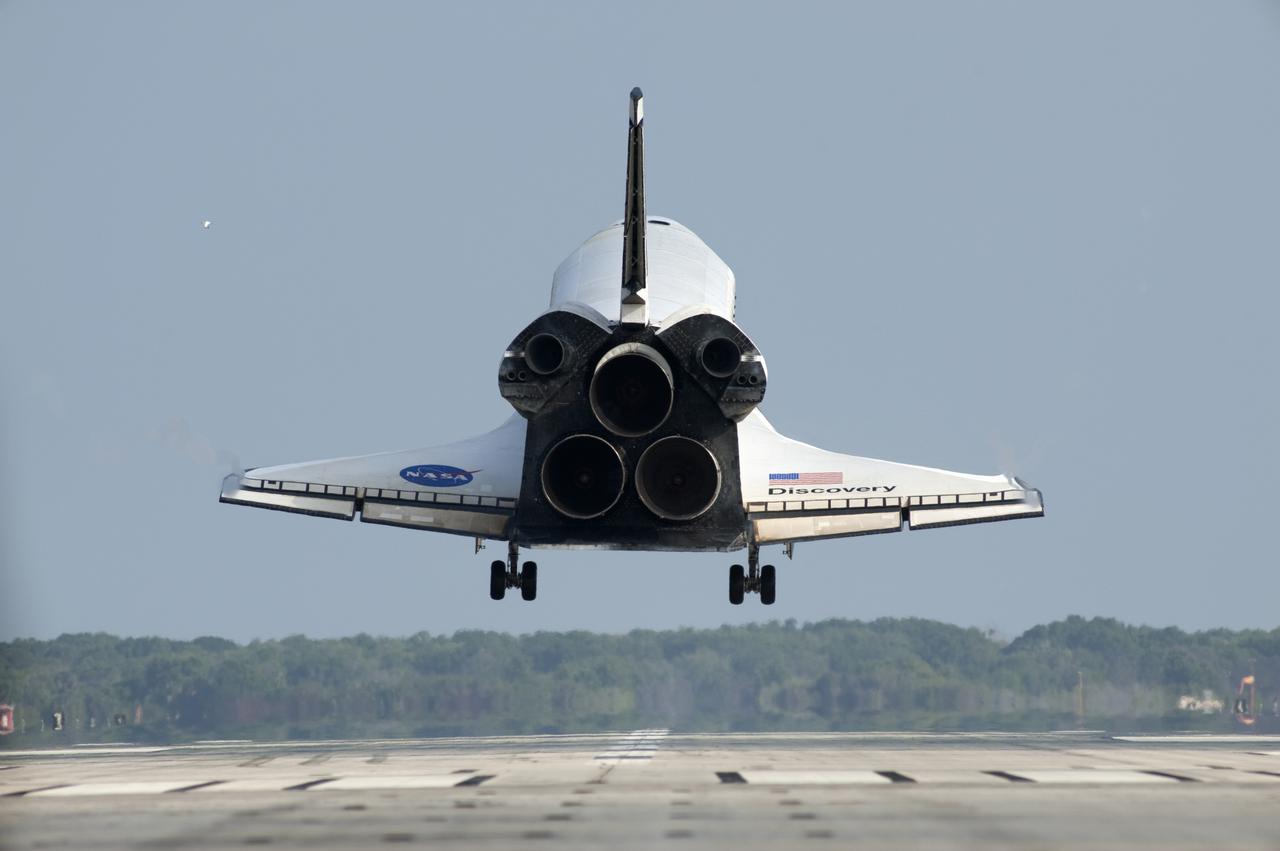CAPE CANAVERAL, Fla. - Space shuttle Discovery is moments away from touchdown on Runway 33 at the Shuttle Landing Facility at NASA's Kennedy Space Center in Florida.  Landing was at 9:08 a.m. EDT, completing the 15-day STS-131 mission to the International Space Station.  Main gear touchdown was at 9:08:35 a.m. EDT followed by nose gear touchdown at 9:08:47 a.m. and wheelstop at 9:09:33 a.m.  Aboard are Commander Alan Poindexter; Pilot James P. Dutton Jr.; and Mission Specialists Rick Mastracchio, Clayton Anderson, Dorothy Metcalf-Lindenburger, Stephanie Wilson and Naoko Yamazaki of the Japan Aerospace Exploration Agency.  The seven-member STS-131 crew carried the multi-purpose logistics module Leonardo, filled with supplies, a new crew sleeping quarters and science racks that were transferred to the International Space Station's laboratories.  The crew also switched out a gyroscope on the station’s truss, installed a spare ammonia storage tank and retrieved a Japanese experiment from the station’s exterior.  STS-131 is the 33rd shuttle mission to the station and the 131st shuttle mission overall. For information on the STS-131 mission and crew, visit http:__www.nasa.gov_mission_pages_shuttle_shuttlemissions_sts131_index.html.  Photo credit: NASA_Tony Gray and Tom Farrar