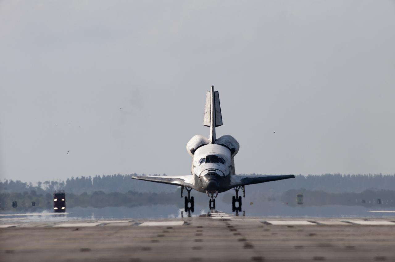 CAPE CANAVERAL, Fla. - Space shuttle Discovery lands on Runway 33 at the Shuttle Landing Facility at NASA's Kennedy Space Center in Florida at 9:08 a.m. EDT, completing the 15-day STS-131 mission to the International Space Station.  Main gear touchdown was at 9:08:35 a.m. EDT followed by nose gear touchdown at 9:08:47 a.m. and wheelstop at 9:09:33 a.m.  Aboard are Commander Alan Poindexter; Pilot James P. Dutton Jr.; and Mission Specialists Rick Mastracchio, Clayton Anderson, Dorothy Metcalf-Lindenburger, Stephanie Wilson and Naoko Yamazaki of the Japan Aerospace Exploration Agency.  The seven-member STS-131 crew carried the multi-purpose logistics module Leonardo, filled with supplies, a new crew sleeping quarters and science racks that were transferred to the International Space Station's laboratories.  The crew also switched out a gyroscope on the station’s truss, installed a spare ammonia storage tank and retrieved a Japanese experiment from the station’s exterior.  STS-131 is the 33rd shuttle mission to the station and the 131st shuttle mission overall. For information on the STS-131 mission and crew, visit http:__www.nasa.gov_mission_pages_shuttle_shuttlemissions_sts131_index.html.  Photo credit: NASA_Sandra Joseph and Kevin O'Connell