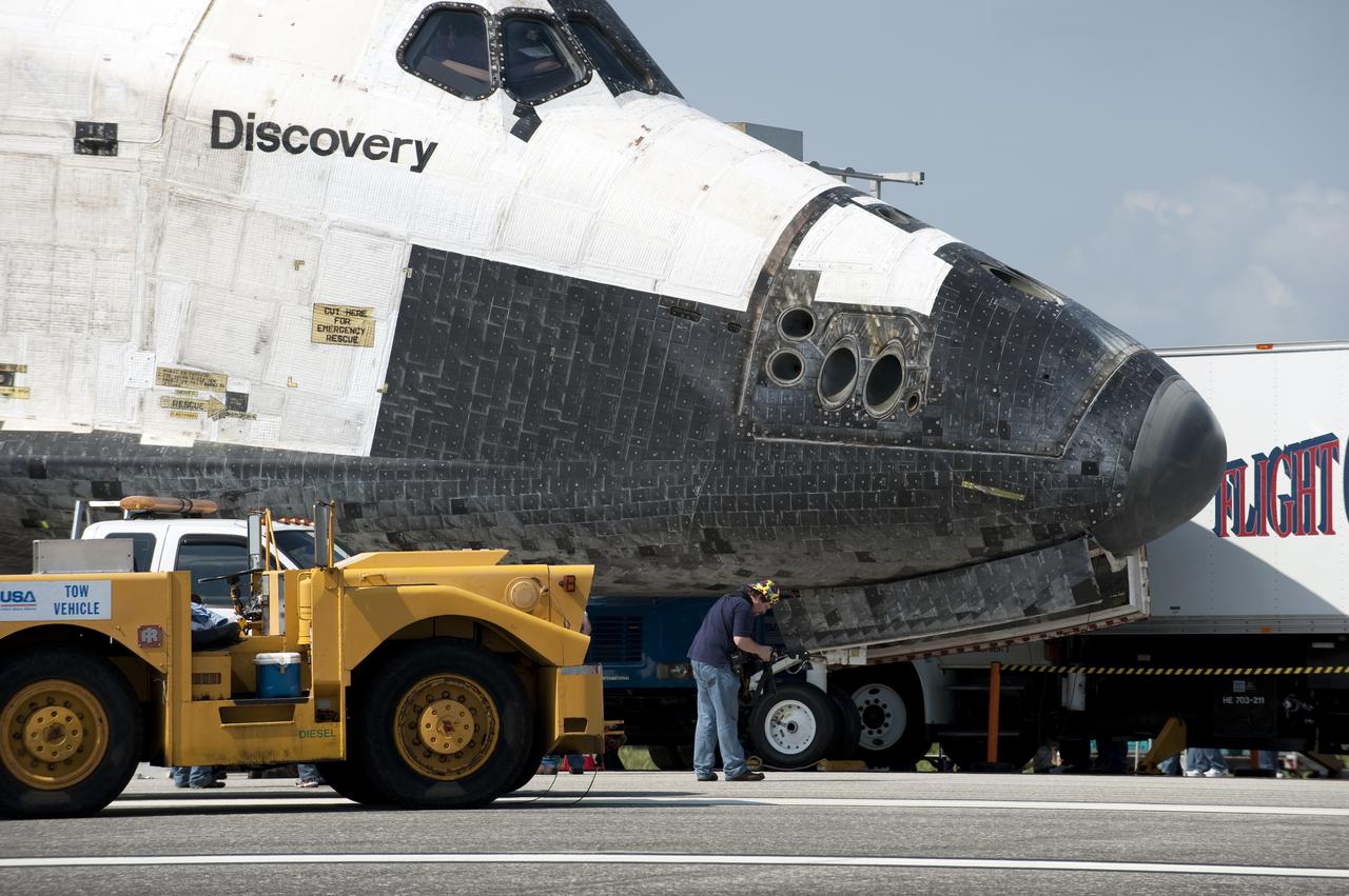 CAPE CANAVERAL, Fla. - At NASA's Kennedy Space Center in Florida, a member of the convoy team does his part to 'safe' space shuttle Discovery after its landing on Runway 33 at the Shuttle Landing Facility.  Discovery landed at Kennedy after 15 days in space, completing the more than 6.2-million-mile STS-131 mission on orbit 238.  Main gear touchdown was at 9:08:35 a.m. EDT followed by nose gear touchdown at 9:08:47 a.m. and wheelstop at 9:09:33 a.m.  Aboard are Commander Alan Poindexter; Pilot James P. Dutton Jr.; and Mission Specialists Rick Mastracchio, Clayton Anderson, Dorothy Metcalf-Lindenburger, Stephanie Wilson and Naoko Yamazaki of the Japan Aerospace Exploration Agency.  The seven-member STS-131 crew carried the multi-purpose logistics module Leonardo, filled with supplies, a new crew sleeping quarters and science racks that were transferred to the International Space Station's laboratories.  The crew also switched out a gyroscope on the station’s truss, installed a spare ammonia storage tank and retrieved a Japanese experiment from the station’s exterior.  STS-131 is the 33rd shuttle mission to the station and the 131st shuttle mission overall. For information on the STS-131 mission and crew, visit http:__www.nasa.gov_mission_pages_shuttle_shuttlemissions_sts131_index.html.  Photo credit: NASA_Kevin O'Connell