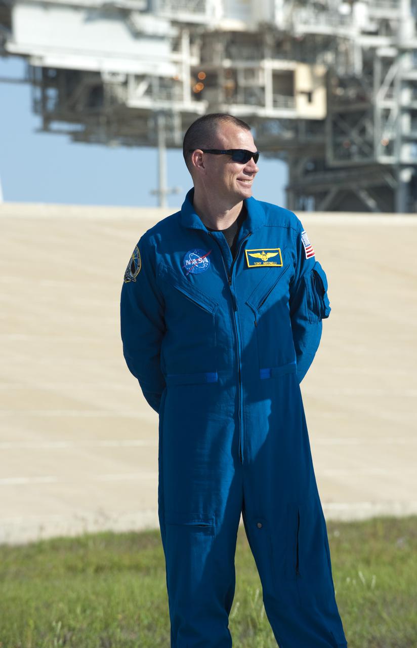 CAPE CANAVERAL, Fla. - At Launch Pad 39A at NASA's Kennedy Space Center in Florida, STS-132 Pilot Tony Antonelli participates in a question-and-answer session with media representatives. The crew is at Kennedy for their Terminal Countdown Demonstration Test, or TCDT, a dress rehearsal for launch. TCDT provides each shuttle crew and launch team the opportunity to participate in various simulated countdown activities, including equipment familiarization and emergency training. On the STS-132 mission, the six-member crew will deliver an Integrated Cargo Carrier, or ICC, and the Russian-built Mini-Research Module-1, or MRM-1, to the International Space Station aboard space shuttle Atlantis. The ICC is an unpressurized flat bed pallet and keel yoke assembly used to support the transfer of exterior cargo from the shuttle to the space station. The MRM-1, known as Rassvet, is the second in a series of new pressurized components for Russia and will be permanently attached to the Earth-facing port of the Zarya control module. Rassvet, which translates to 'dawn,' will be used for cargo storage and will provide an additional docking port to the station. STS-132 is the 34th mission to the station and the 132nd shuttle mission overall. Atlantis is targeted to launch on May 14 at 2:19 p.m. For information on the STS-132 mission, visit http:__www.nasa.gov_mission_pages_shuttle_shuttlemissions_sts132_index.html. Photo credit: NASA_Kim Shiflett