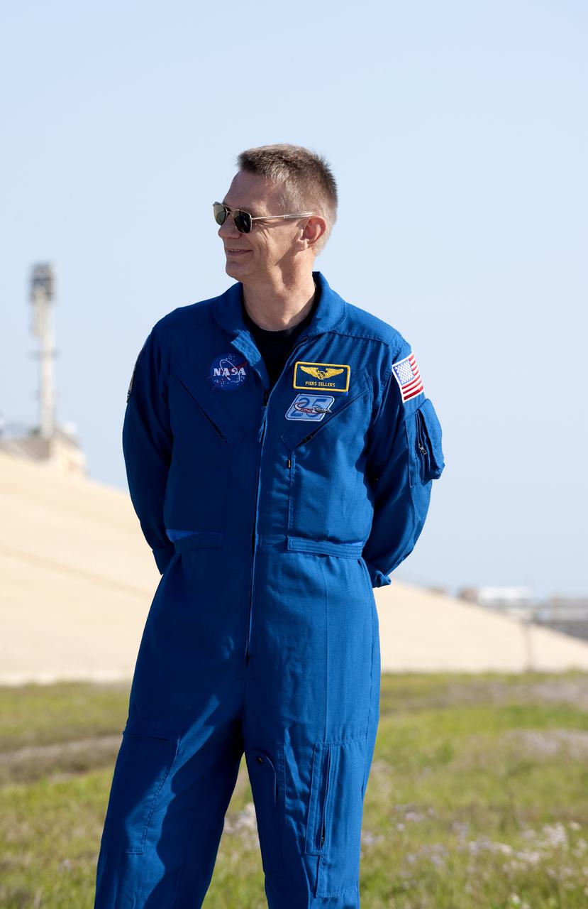 CAPE CANAVERAL, Fla. - At Launch Pad 39A at NASA's Kennedy Space Center in Florida, STS-132 Mission Specialist Piers Sellers participates in a question-and-answer session with media representatives. The crew is at Kennedy for their Terminal Countdown Demonstration Test, or TCDT, a dress rehearsal for launch. TCDT provides each shuttle crew and launch team the opportunity to participate in various simulated countdown activities, including equipment familiarization and emergency training. On the STS-132 mission, the six-member crew will deliver an Integrated Cargo Carrier, or ICC, and the Russian-built Mini-Research Module-1, or MRM-1, to the International Space Station aboard space shuttle Atlantis. The ICC is an unpressurized flat bed pallet and keel yoke assembly used to support the transfer of exterior cargo from the shuttle to the space station. The MRM-1, known as Rassvet, is the second in a series of new pressurized components for Russia and will be permanently attached to the Earth-facing port of the Zarya control module. Rassvet, which translates to 'dawn,' will be used for cargo storage and will provide an additional docking port to the station. STS-132 is the 34th mission to the station and the 132nd shuttle mission overall. Atlantis is targeted to launch on May 14 at 2:19 p.m. For information on the STS-132 mission, visit http:__www.nasa.gov_mission_pages_shuttle_shuttlemissions_sts132_index.html. Photo credit: NASA_Kim Shiflett