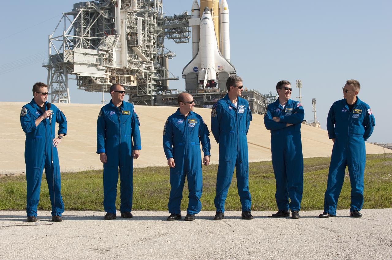 CAPE CANAVERAL, Fla. - At Launch Pad 39A at NASA's Kennedy Space Center in Florida, STS-132 Mission Specialist Piers Sellers, right, takes some teasing from Commander Ken Ham, at the microphone, during a question-and-answer session with media representatives. Also on the STS-132 crew are, from left, Pilot Tony Antonelli and Mission Specialists Garrett Reisman, Michael Good, and Steve Bowen. The crew is at Kennedy for their Terminal Countdown Demonstration Test, or TCDT, a dress rehearsal for launch. TCDT provides each shuttle crew and launch team the opportunity to participate in various simulated countdown activities, including equipment familiarization and emergency training. On the STS-132 mission, the six-member crew will deliver an Integrated Cargo Carrier, or ICC, and the Russian-built Mini-Research Module-1, or MRM-1, to the International Space Station aboard space shuttle Atlantis. The ICC is an unpressurized flat bed pallet and keel yoke assembly used to support the transfer of exterior cargo from the shuttle to the space station. The MRM-1, known as Rassvet, is the second in a series of new pressurized components for Russia and will be permanently attached to the Earth-facing port of the Zarya control module. Rassvet, which translates to 'dawn,' will be used for cargo storage and will provide an additional docking port to the station. STS-132 is the 34th mission to the station and the 132nd shuttle mission overall. Atlantis is targeted to launch on May 14 at 2:19 p.m. For information on the STS-132 mission, visit http:__www.nasa.gov_mission_pages_shuttle_shuttlemissions_sts132_index.html. Photo credit: NASA_Kim Shiflett