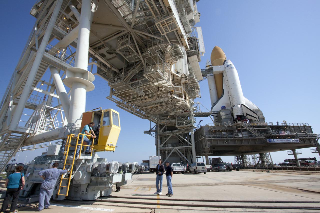 CAPE CANAVERAL, Fla. – On Launch Pad 39A at NASA's Kennedy Space Center in Florida, preparations are under way to close the pad's rotating service structure around space shuttle Atlantis.  This mobile structure provides protected access to the shuttle for installation and servicing of payloads at the pad, as well as servicing access to certain systems on the shuttle.  Atlantis' first motion on its 3.4-mile trip from the Vehicle Assembly Building was at 11:31 p.m. EDT April 21.  The shuttle was secured, or 'hard down,' on the pad at 6:03 a.m. April 22.  Rollout is a significant milestone in launch processing activities.  On the STS-132 mission, the six-member crew will deliver an Integrated Cargo Carrier, or ICC, and the Russian-built Mini-Research Module-1, or MRM-1, to the International Space Station.  The ICC is an unpressurized flat bed pallet and keel yoke assembly used to support the transfer of exterior cargo from the shuttle to the space station.  The MRM-1, known as Rassvet, is the second in a series of new pressurized components for Russia and will be permanently attached to the Earth-facing port of the Zarya control module. Rassvet, which translates to 'dawn,' will be used for cargo storage and will provide an additional docking port to the station.  STS-132 is the 34th mission to the station and the 132nd shuttle mission overall.   Atlantis is targeted to launch on May 14 at 2:19 p.m.  For information on the STS-132 mission, visit http:__www.nasa.gov_mission_pages_shuttle_shuttlemissions_sts132_index.html. Photo credit: NASA_Jack Pfaller