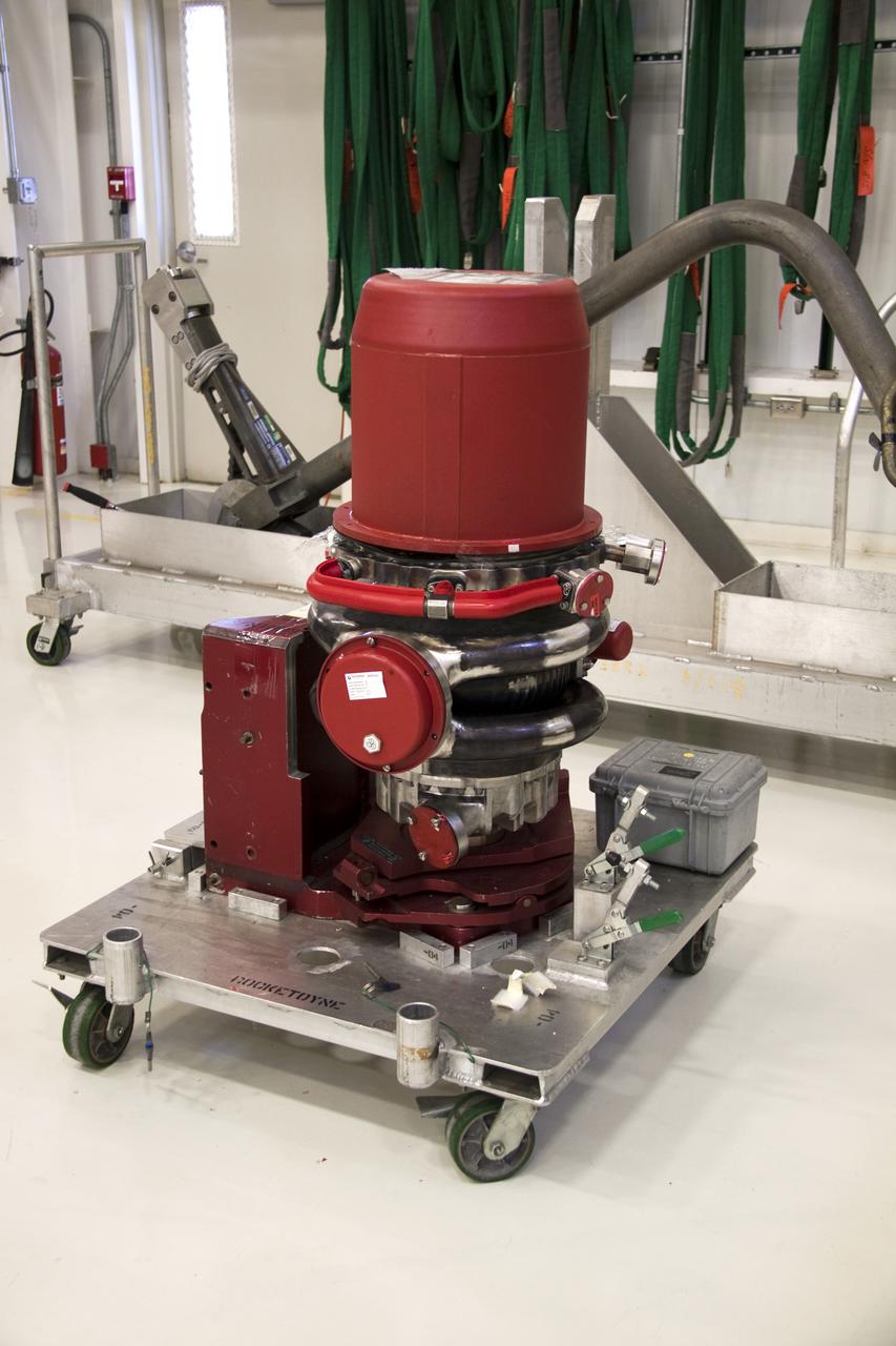 CAPE CANAVERAL, Fla. – In the Space Shuttle Main Engine Processing Facility at NASA's Kennedy Space Center in Florida, preparations are under way to install this high pressure oxidizer turbo pump on space shuttle main engine no. 2062.  The engine, or SSME, is the last one scheduled to be built at Kennedy by Pratt and Whitney Rocketdyne before the end of the Space Shuttle Program.  Three main engines are clustered at the aft end of the shuttle and have a combined thrust of more than 1.2 million pounds.  Even though an SSME weighs one-seventh as much as a locomotive engine, its high-pressure fuel pump alone delivers as much horsepower as 28 locomotives.  Each engine operates during the entire eight-and-a-half minute climb to orbit.  Post-flight inspections and maintenance of each engine also are conducted in the SSME Processing Facility between shuttle missions.  Photo credit: NASA_Amanda Diller