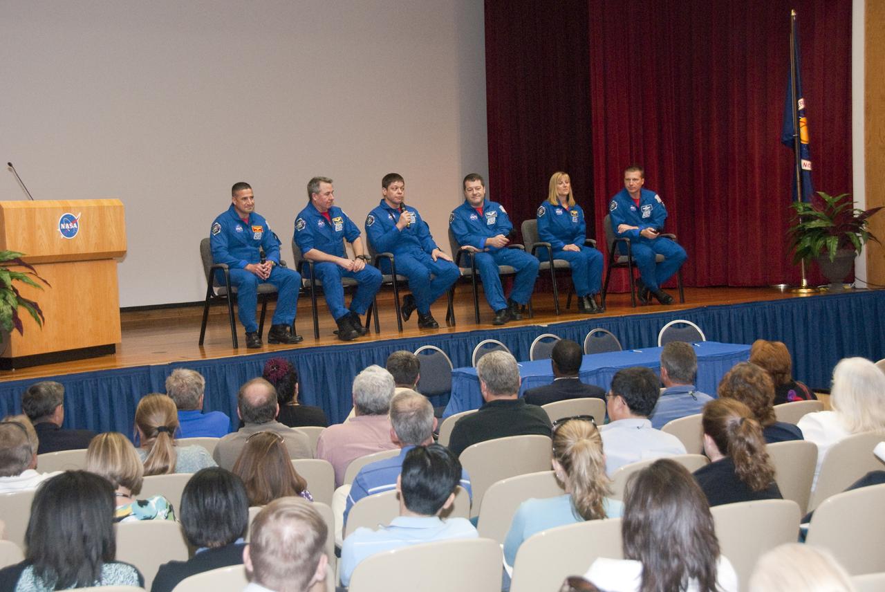 CAPE CANAVERAL, Fla. - In the Training Auditorium at NASA's Kennedy Space Center in Florida, the members of space shuttle Endeavour's STS-130 crew discuss the highlights of their mission with Kennedy employees.  From left are Commander George Zamka; Mission Specialists Stephen Robinson, Robert Behnken (with microphone), Nicholas Patrick, and Kathryn Hire; and Pilot Terry Virts.  Endeavour launched Feb. 8, 2010, and landed Feb. 21.  During Endeavour's STS-130 mission, the crew installed the Tranquility node, a module that provides additional room for crew members and many of the station's life support and environmental control systems. Attached to Tranquility is a cupola with seven windows that provide a panoramic view of Earth, celestial objects and visiting spacecraft. STS-130 was the 24th flight for Endeavour, the 32nd shuttle mission devoted to ISS assembly and maintenance, and the 130th shuttle mission.  For information on the STS-130 mission and crew, visit http:__www.nasa.gov_mission_pages_shuttle_shuttlemissions_sts130_index.html.  Photo credit: NASA_Jim Grossmann