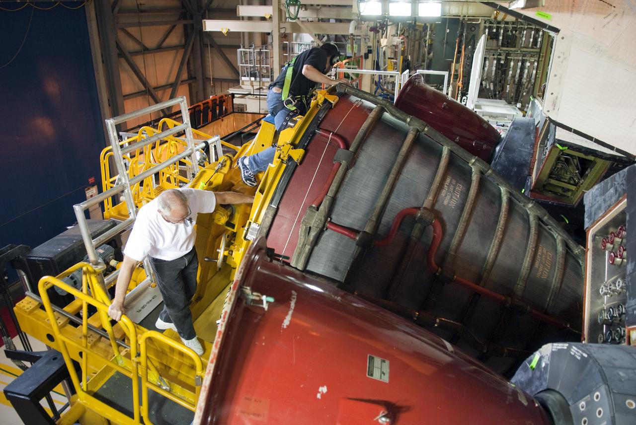 STS-133 DISCOBVERY ENGINE-3 REMOVAL IN OPF-3 AND XFERRED TO ENGINE SHOP