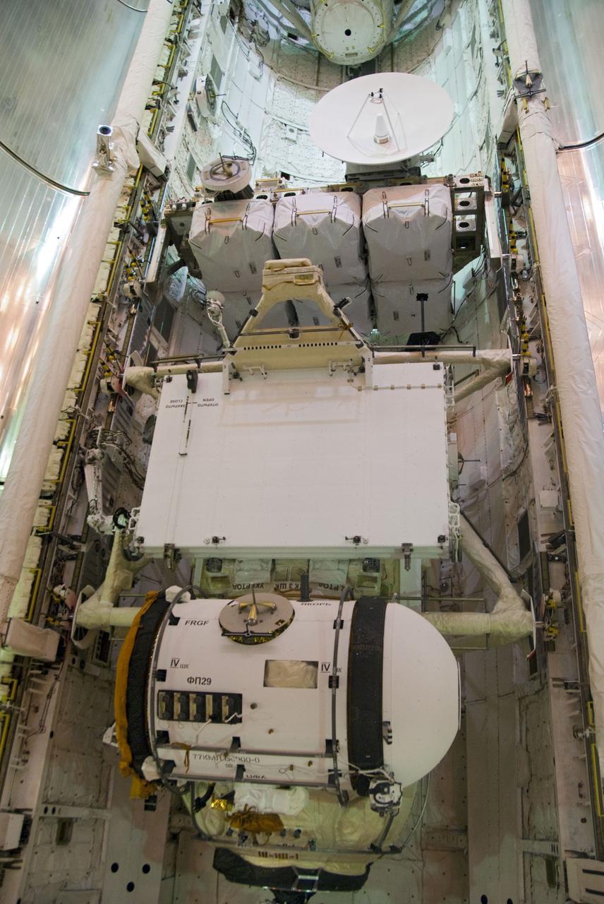 CAPE CANAVERAL, Fla. - At Launch Pad 39A at NASA's Kennedy Space Center in Florida, preparations are under way to close space shuttle Atlantis' payload bay doors for launch to the International Space Station. Secured in the bay is the primary payload for Atlantis' STS-132 mission, the Russian-built Mini Research Module-1. A set of batteries for the station's truss and space-to-ground antenna, along with other replacement parts are installed on the Integrated Cargo Carrier. Atlantis' launch is targeted for May 14 at 2:20 p.m. EDT. For more information on the STS-132 mission objectives, payload and crew, visit www.nasa.gov_mission_pages_shuttle_shuttlemissions_sts132_index.html. Photo Credit: NASA_Cory Huston