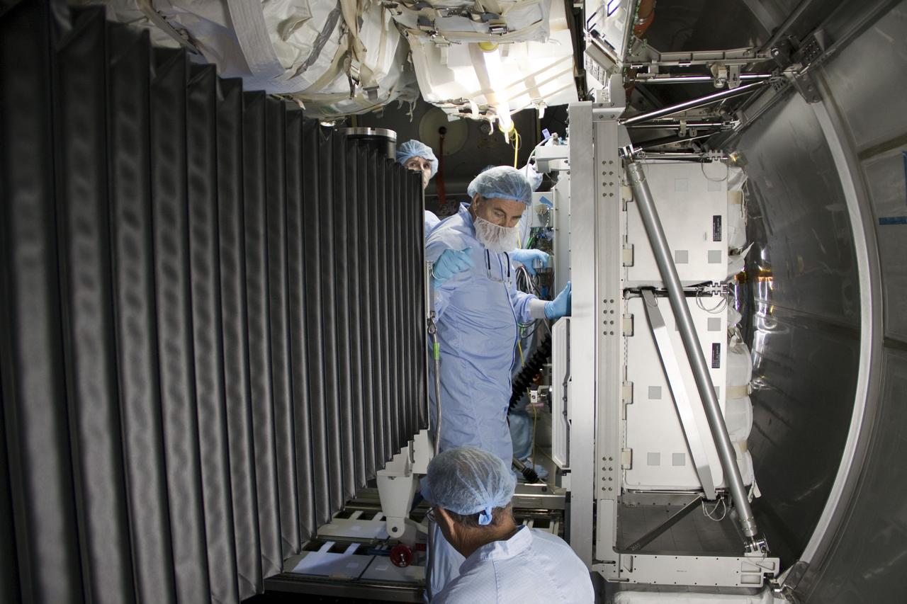 STS-133 MPLM RACK REMOVAL AND CONVERSION TO PERMANENT MODULE