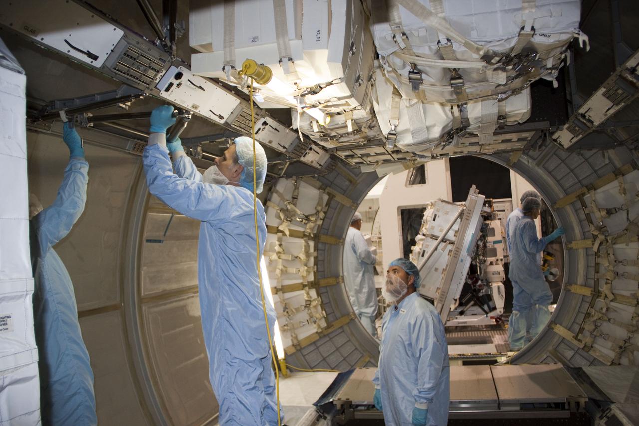 STS-133 MPLM RACK REMOVAL AND CONVERSION TO PERMANENT MODULE