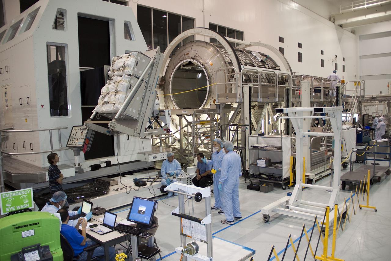 STS-133 MPLM RACK REMOVAL AND CONVERSION TO PERMANENT MODULE