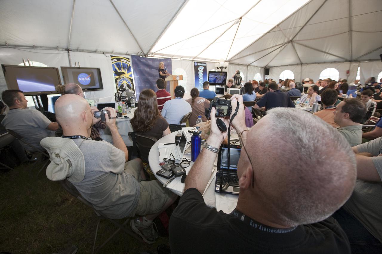 CAPE CANAVERAL, Fla. - At NASA's Kennedy Space Center in Florida, NASA's space shuttle Discovery Flow Director Stephanie Stilson has a rapt audience in the participants of NASA's STS-132 Tweetup.  NASA is hosting 150 people from around the world and providing them with a behind-the-scenes perspective to share with their followers via the social networking service Twitter.  Attendees were randomly selected from more than 1,000 online registrations and include people from more than 30 states, the District of Columbia, Puerto Rico, the Netherlands, New Zealand and England. The Tweeters are being given the chance to meet with shuttle technicians, managers, engineers and astronauts, to take a tour of Kennedy, and to experience the exhilaration of the launch of space shuttle Atlantis' STS-132 mission.  A tent was set up especially for the occasion near the countdown clock at Kennedy's Press Site.  Atlantis' liftoff is set for 2:20 p.m. EDT on May 14.  STS-132 is the 34th mission to the station and the last scheduled flight for Atlantis. For more information on the STS-132 mission objectives, payload and crew, visit http:__www.nasa.gov_mission_pages_shuttle_shuttlemissions_sts132_index.html. Photo Credit: NASA_Amanda Diller