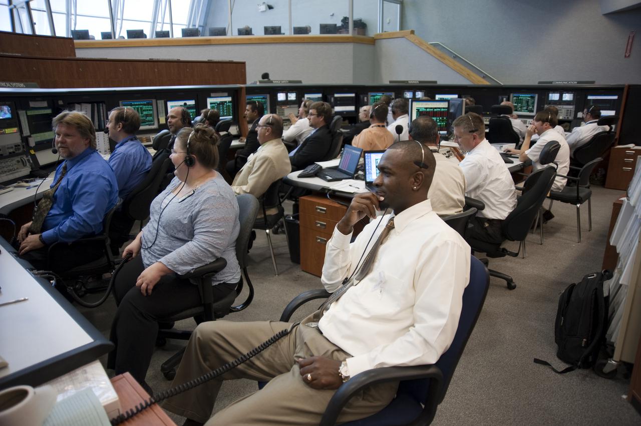 CAPE CANAVERAL, Fla. -- In Firing Room 4 of the Launch Control Center at NASA's Kennedy Space Center in Florida, launch controllers  keep track of the imminent launch of space shuttle Atlantis on its STS-132 mission to the International Space Station. The launch team worked very few issues during the countdown and picture-perfect weather led to an on-time launch at 2:20 p.m. EDT on May 14.  STS-132 is the 132nd shuttle flight, the 32nd for Atlantis and the 34th shuttle mission dedicated to station assembly and maintenance. For more information on the STS-132 mission objectives, payload and crew, visit www.nasa.gov_mission_pages_shuttle_shuttlemissions_sts132_index.html. Photo credit: NASA_Kim Shiflett