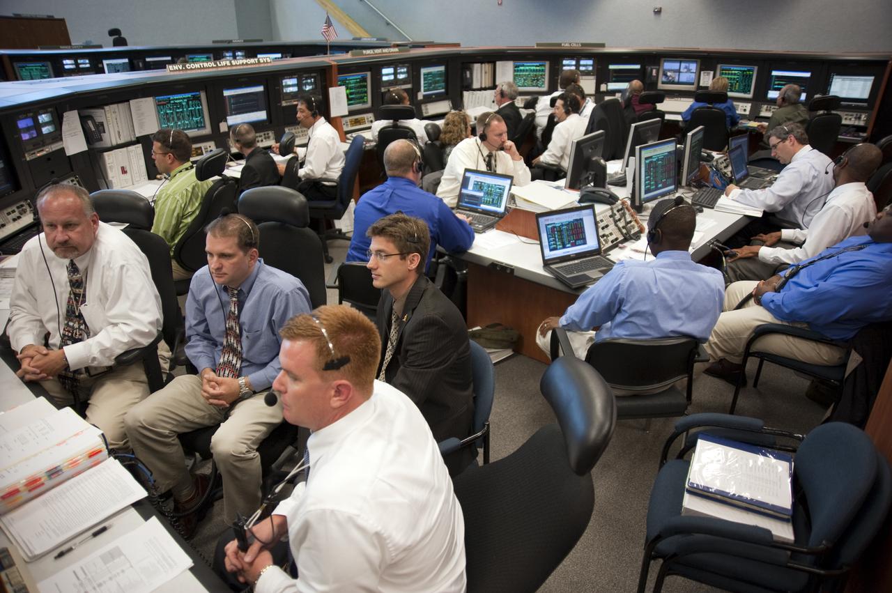 CAPE CANAVERAL, Fla. -- In Firing Room 4 of the Launch Control Center at NASA's Kennedy Space Center in Florida, launch controllers  keep track of the imminent launch of space shuttle Atlantis on its STS-132 mission to the International Space Station. The launch team worked very few issues during the countdown and picture-perfect weather led to an on-time launch at 2:20 p.m. EDT on May 14.  STS-132 is the 132nd shuttle flight, the 32nd for Atlantis and the 34th shuttle mission dedicated to station assembly and maintenance. For more information on the STS-132 mission objectives, payload and crew, visit www.nasa.gov_mission_pages_shuttle_shuttlemissions_sts132_index.html. Photo credit: NASA_Kim Shiflett