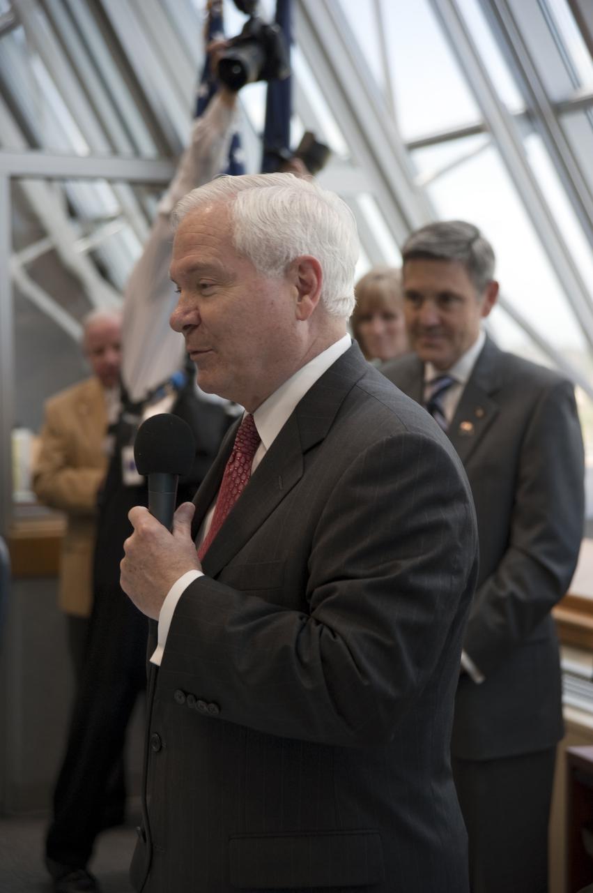 CAPE CANAVERAL, Fla. -- U.S. Secretary of Defense Robert Gates congratulates the launch team in Firing Room 4 of the Launch Control Center at NASA's Kennedy Space Center in Florida after the successful launch of space shuttle Atlantis on its STS-132 mission to the International Space Station. In the background, at right, is Kennedy Center Director Bob Cabana. Launch was on time at 2:20 p.m. EDT.   STS-132 is the 132nd shuttle flight, the 32nd for Atlantis and the 34th shuttle mission dedicated to station assembly and maintenance. For more information on the STS-132 mission objectives, payload and crew, visit www.nasa.gov_mission_pages_shuttle_shuttlemissions_sts132_index.html. Photo credit: NASA_Kim Shiflett