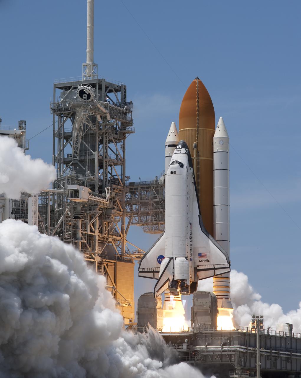CAPE CANAVERAL, Fla. - A plume of smoke builds at NASA Kennedy Space Center's Launch Pad 39A as space shuttle Atlantis' twin solid rocket boosters ignite to propel the spacecraft skyward at 2:20 p.m. EDT on May 14. On board Atlantis, for its last planned flight, are six veteran NASA astronauts. Atlantis' primary payload for the STS-132 mission is the Russian-built Mini Research Module-1, which will provide additional storage space and a new docking port for Russian Soyuz and Progress spacecraft aboard the International Space Station. STS-132 is the 132nd shuttle flight, the 32nd for Atlantis and the 34th shuttle mission dedicated to station assembly and maintenance. For more information on the STS-132 mission objectives, payload and crew, visit www.nasa.gov_mission_pages_shuttle_shuttlemissions_sts132_index.html. Photo credit: NASA_Sandra Joseph and Kevin O'Connell