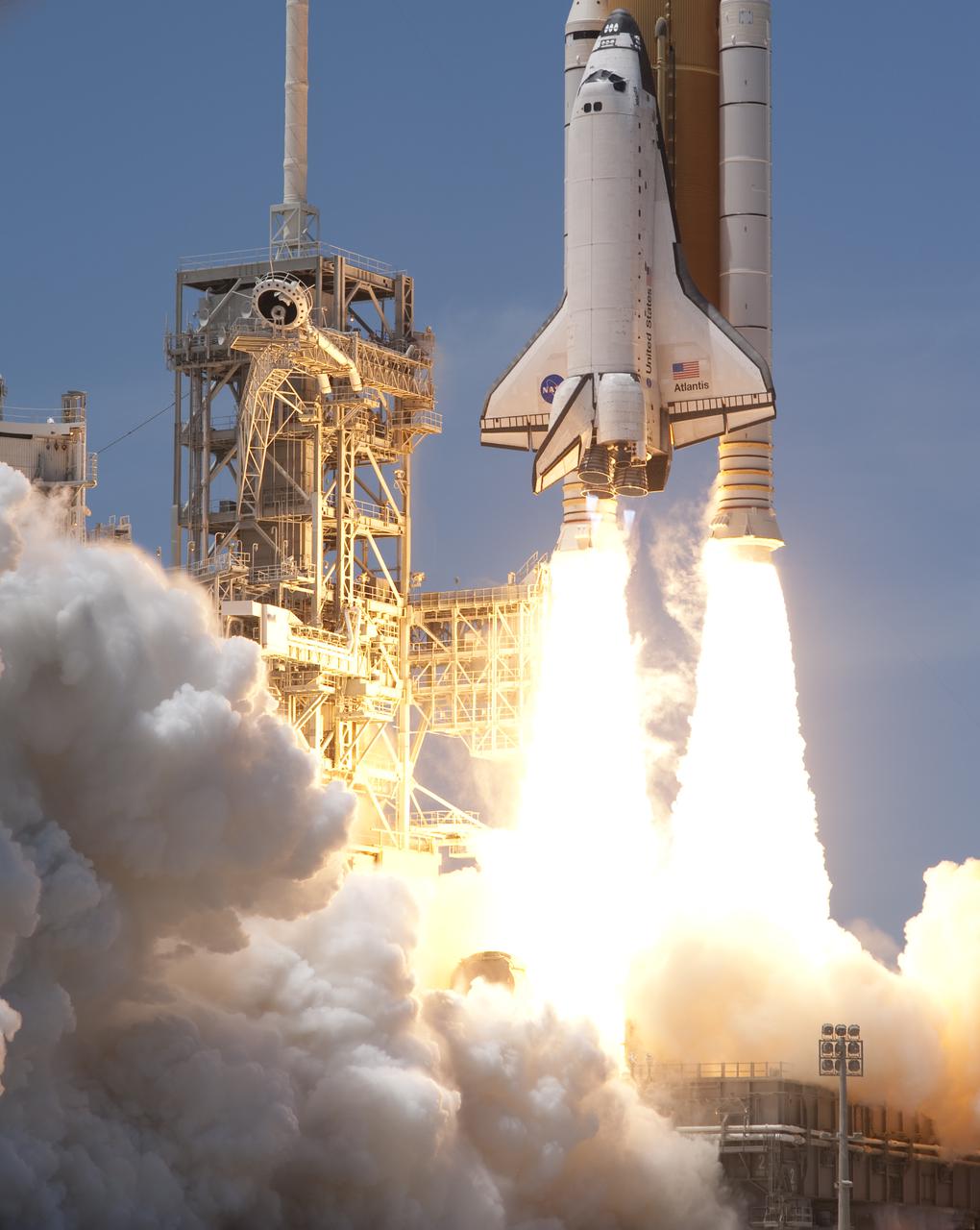 CAPE CANAVERAL, Fla. - A plume of smoke builds at NASA Kennedy Space Center's Launch Pad 39A as space shuttle Atlantis' twin solid rocket boosters ignite to propel the spacecraft skyward at 2:20 p.m. EDT on May 14. On board Atlantis, for its last planned flight, are six veteran NASA astronauts.  Atlantis' primary payload for the STS-132 mission is the Russian-built Mini Research Module-1, which will provide additional storage space and a new docking port for Russian Soyuz and Progress spacecraft aboard the International Space Station. STS-132 is the 132nd shuttle flight, the 32nd for Atlantis and the 34th shuttle mission dedicated to station assembly and maintenance. For more information on the STS-132 mission objectives, payload and crew, visit www.nasa.gov_mission_pages_shuttle_shuttlemissions_sts132_index.html. Photo credit: NASA_Sandra Joseph and Kevin O'Connell