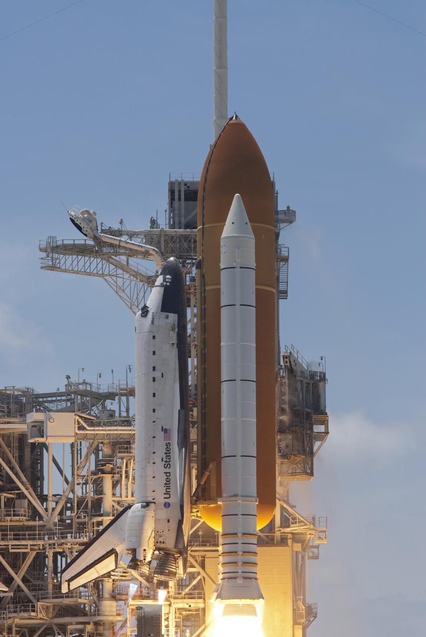 CAPE CANAVERAL, Fla. - Space shuttle Atlantis' twin solid rocket boosters and three main engines ignite to propel the spacecraft off NASA Kennedy Space Center's Launch Pad 39A and into orbit at 2:20 p.m. EDT on May 14. On board Atlantis, for its last planned flight, are six veteran NASA astronauts.  Atlantis' primary payload for the STS-132 mission is the Russian-built Mini Research Module-1, which will provide additional storage space and a new docking port for Russian Soyuz and Progress spacecraft aboard the International Space Station. STS-132 is the 132nd shuttle flight, the 32nd for Atlantis and the 34th shuttle mission dedicated to station assembly and maintenance. For more information on the STS-132 mission objectives, payload and crew, visit www.nasa.gov_mission_pages_shuttle_shuttlemissions_sts132_index.html. Photo credit: NASA_Rusty Backer and Michael Gayle