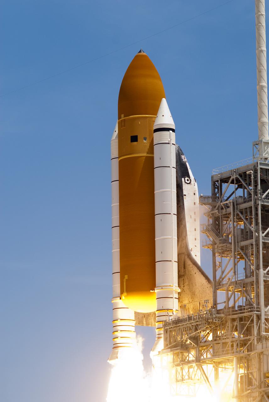 CAPE CANAVERAL, Fla. - Space shuttle Atlantis' twin solid rocket boosters ignite to propel the spacecraft off NASA Kennedy Space Center's Launch Pad 39A and into orbit at 2:20 p.m. EDT on May 14. On board Atlantis, for its last planned flight, are six veteran NASA astronauts.  Atlantis' primary payload for the STS-132 mission is the Russian-built Mini Research Module-1, which will provide additional storage space and a new docking port for Russian Soyuz and Progress spacecraft aboard the International Space Station. STS-132 is the 132nd shuttle flight, the 32nd for Atlantis and the 34th shuttle mission dedicated to station assembly and maintenance. For more information on the STS-132 mission objectives, payload and crew, visit www.nasa.gov_mission_pages_shuttle_shuttlemissions_sts132_index.html. Photo credit: NASA_Rusty Backer and Michael Gayle