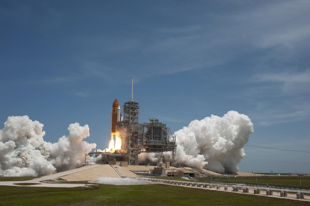 CAPE CANAVERAL, Fla. - At NASA's Kennedy Space Center in Florida, an exhaust plume builds on Launch Pad 39A as space shuttle Atlantis' engines ignite. Liftoff occurred right on time at 2:20 p.m. EDT on May 14.  Atlantis' primary payload for the STS-132 mission is the Russian-built Mini Research Module-1, which will provide additional storage space and a new docking port for Russian Soyuz and Progress spacecraft aboard the International Space Station. STS-132 is the 132nd shuttle flight, the 32nd for Atlantis and the 34th shuttle mission dedicated to station assembly and maintenance. For more information on the STS-132 mission objectives, payload and crew, visit www.nasa.gov_mission_pages_shuttle_shuttlemissions_sts132_index.html. Photo credit: NASA_Sandra Joseph and Kevin O'Connell