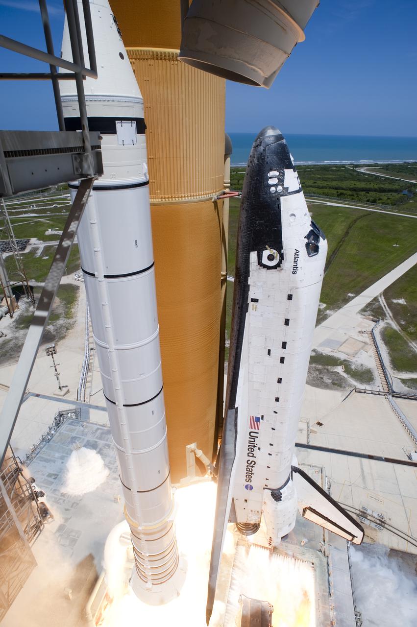 CAPE CANAVERAL, Fla. - Space shuttle Atlantis and its six STS-132 astronauts lift off seaside Launch Pad 39A at NASA's Kennedy Space Center in Florida at 2:20 p.m. EDT on May 14. Atlantis' primary payload for the STS-132 mission is the Russian-built Mini Research Module-1, which will provide additional storage space and a new docking port for Russian Soyuz and Progress spacecraft aboard the International Space Station. STS-132 is the 132nd shuttle flight, the 32nd for Atlantis and the 34th shuttle mission dedicated to station assembly and maintenance. For more information on the STS-132 mission objectives, payload and crew, visit www.nasa.gov_mission_pages_shuttle_shuttlemissions_sts132_index.html. Photo credit: NASA_Tony Gray and Tom Farrar