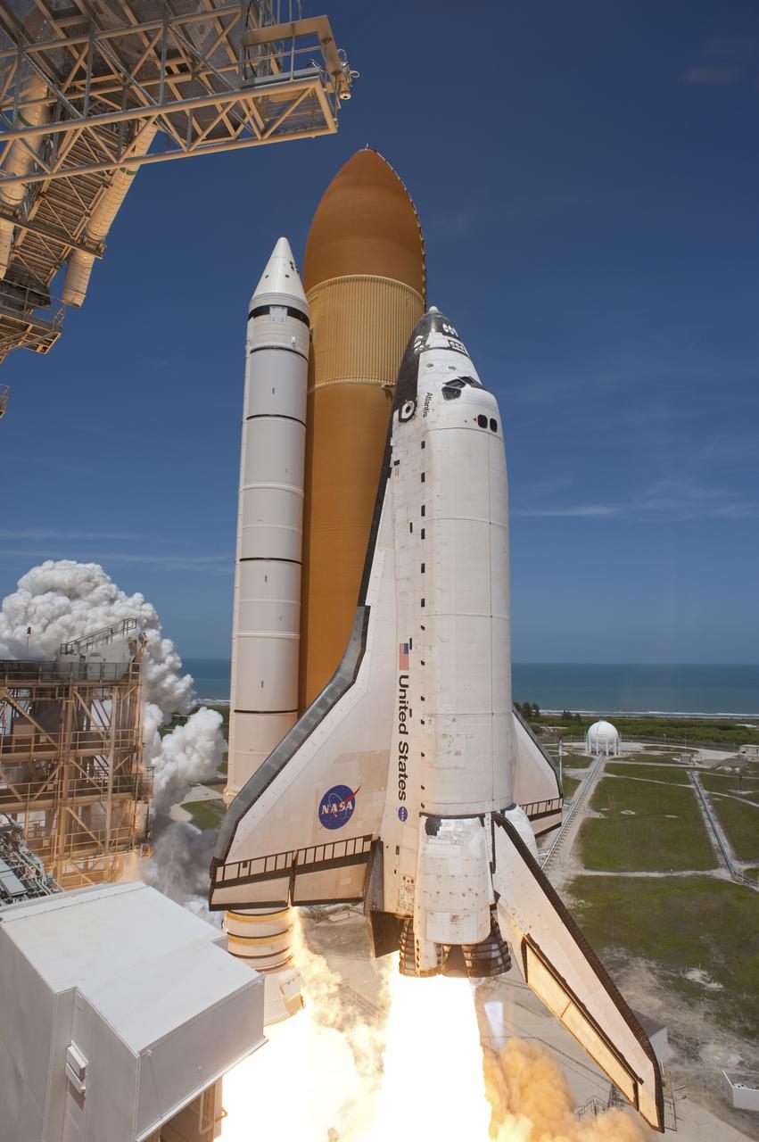 CAPE CANAVERAL, Fla. - Space shuttle Atlantis and its six STS-132 astronauts lift off its seaside launch pad at NASA's Kennedy Space Center in Florida at 2:20 p.m. EDT on May 14.   Atlantis' primary payload for the STS-132 mission is the Russian-built Mini Research Module-1, which will provide additional storage space and a new docking port for Russian Soyuz and Progress spacecraft aboard the International Space Station. STS-132 is the 132nd shuttle flight, the 32nd for Atlantis and the 34th shuttle mission dedicated to station assembly and maintenance. For more information on the STS-132 mission objectives, payload and crew, visit www.nasa.gov_mission_pages_shuttle_shuttlemissions_sts132_index.html. Photo credit: NASA_Sandra Joseph and Kevin O'Connell