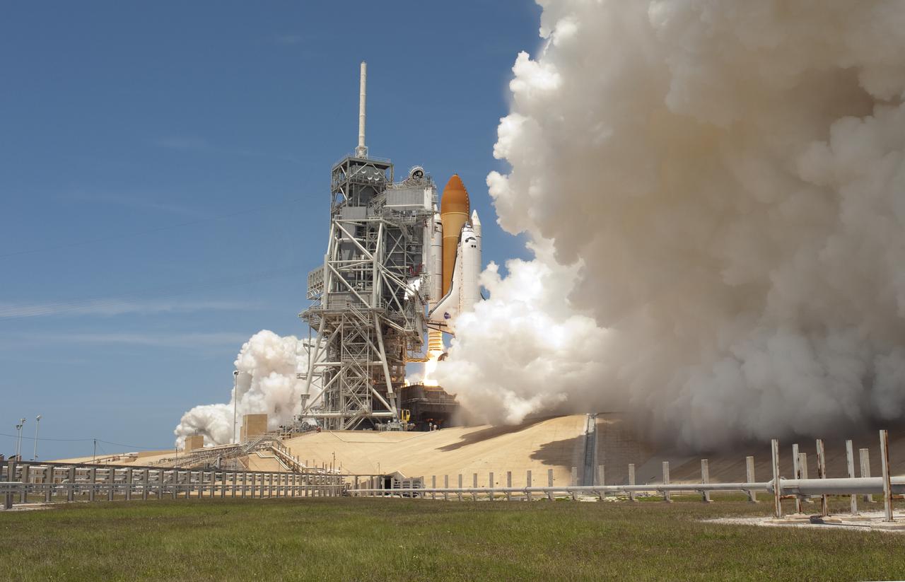 CAPE CANAVERAL, Fla. - At NASA's Kennedy Space Center in Florida, an exhaust plume builds on Launch Pad 39A as space shuttle Atlantis' engines ignite. Liftoff occurred right on time at 2:20 p.m. EDT on May 14.  Atlantis' primary payload for the STS-132 mission is the Russian-built Mini Research Module-1, which will provide additional storage space and a new docking port for Russian Soyuz and Progress spacecraft aboard the International Space Station. STS-132 is the 132nd shuttle flight, the 32nd for Atlantis and the 34th shuttle mission dedicated to station assembly and maintenance. For more information on the STS-132 mission objectives, payload and crew, visit www.nasa.gov_mission_pages_shuttle_shuttlemissions_sts132_index.html. Photo credit: NASA_Sandra Joseph and Kevin O'Connell